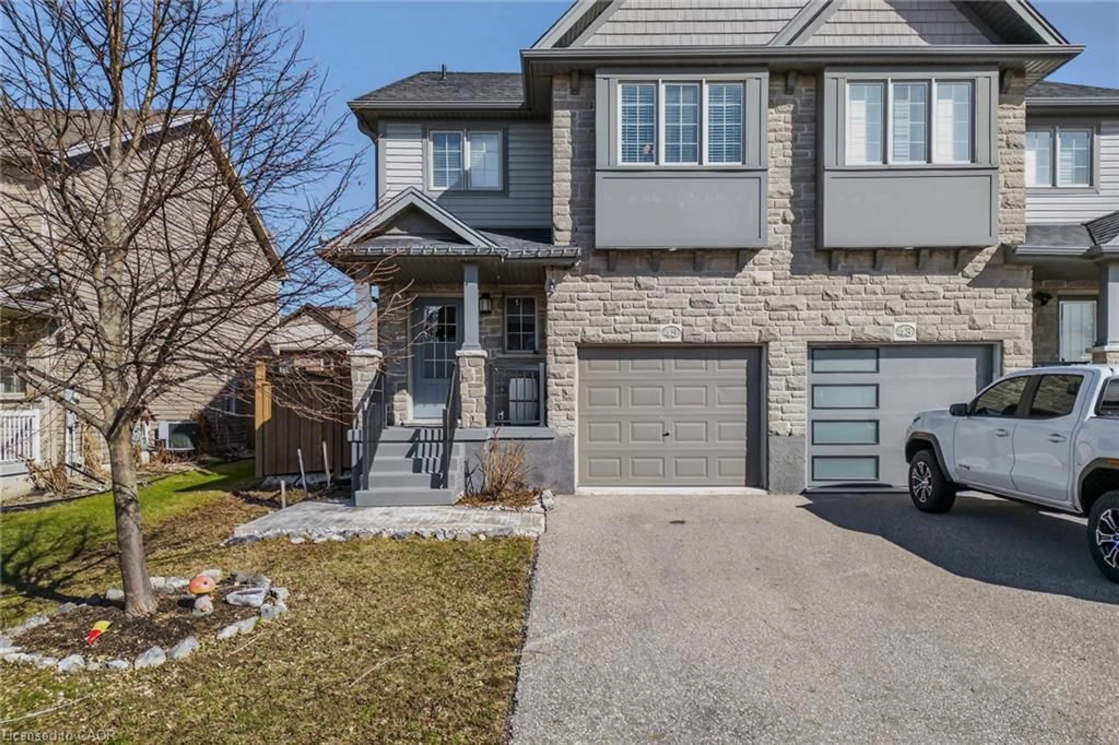 Home with brick exterior material, street for 45 Trillium Way, Simcoe Ontario N3Y 4K2