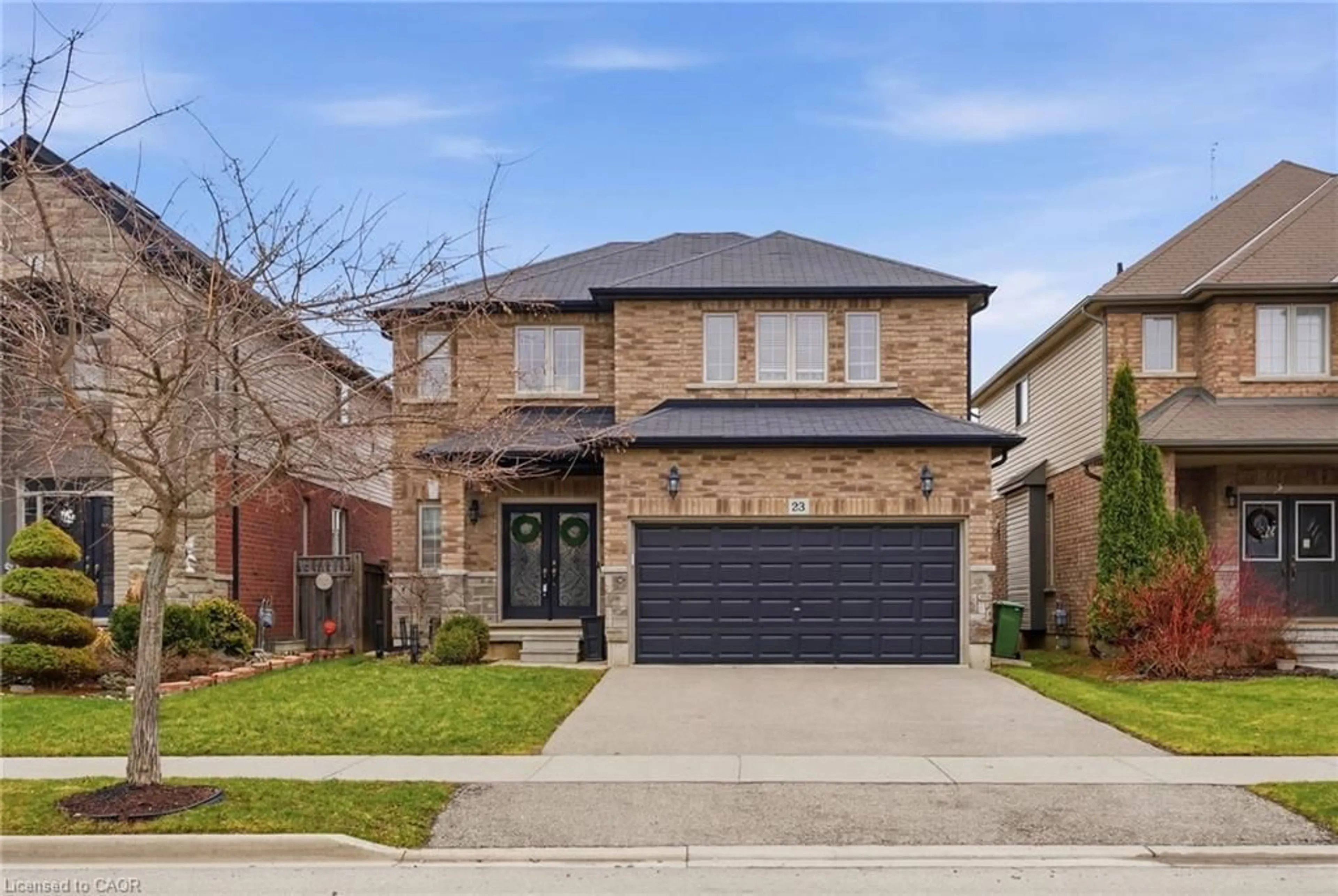 Home with brick exterior material, street for 23 Garinger Cres, Binbrook Ontario L0R 1C0