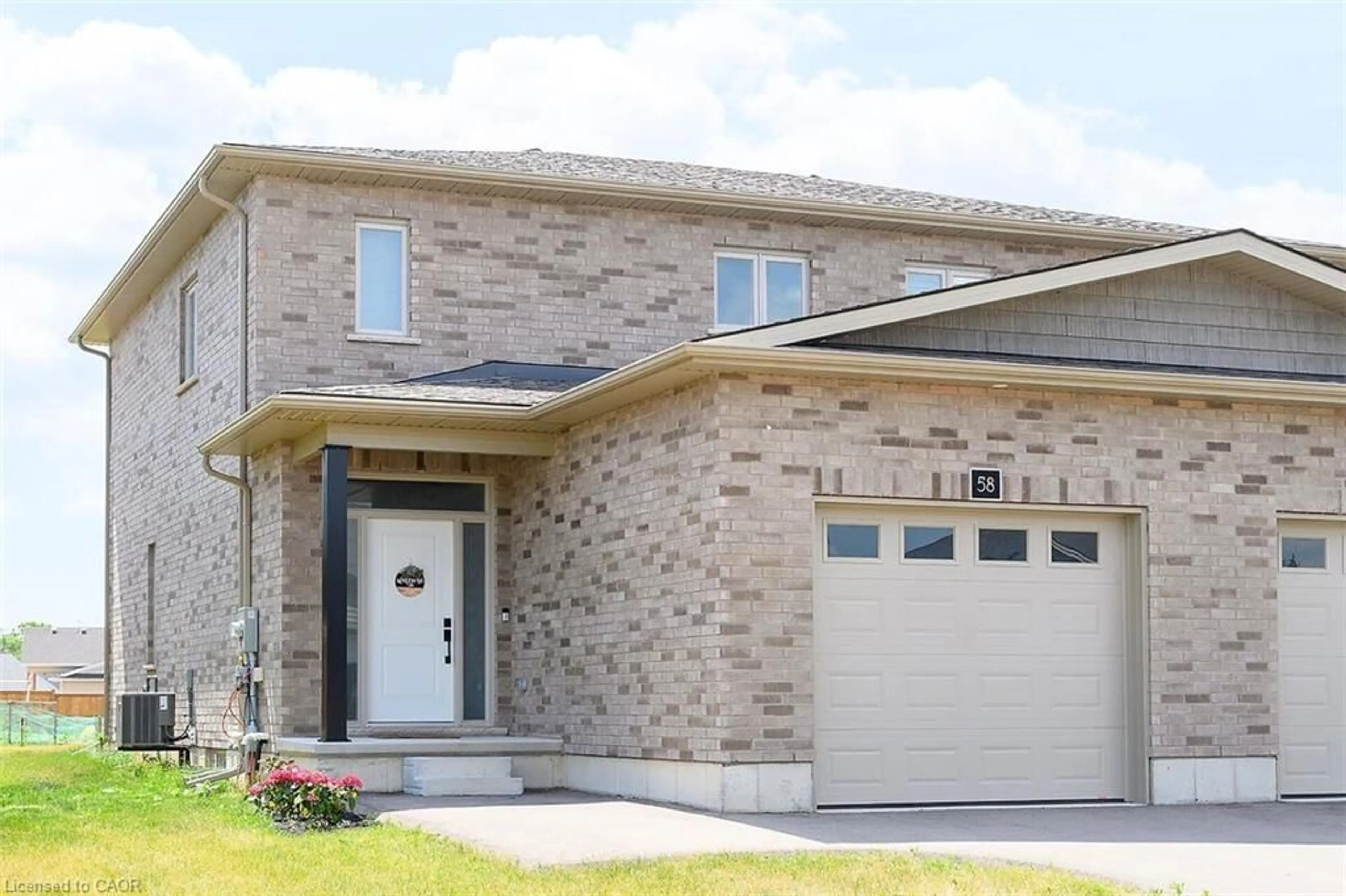 Home with brick exterior material, street for 58 Peachleaf Lane, Waterford Ontario N0E 1Y0