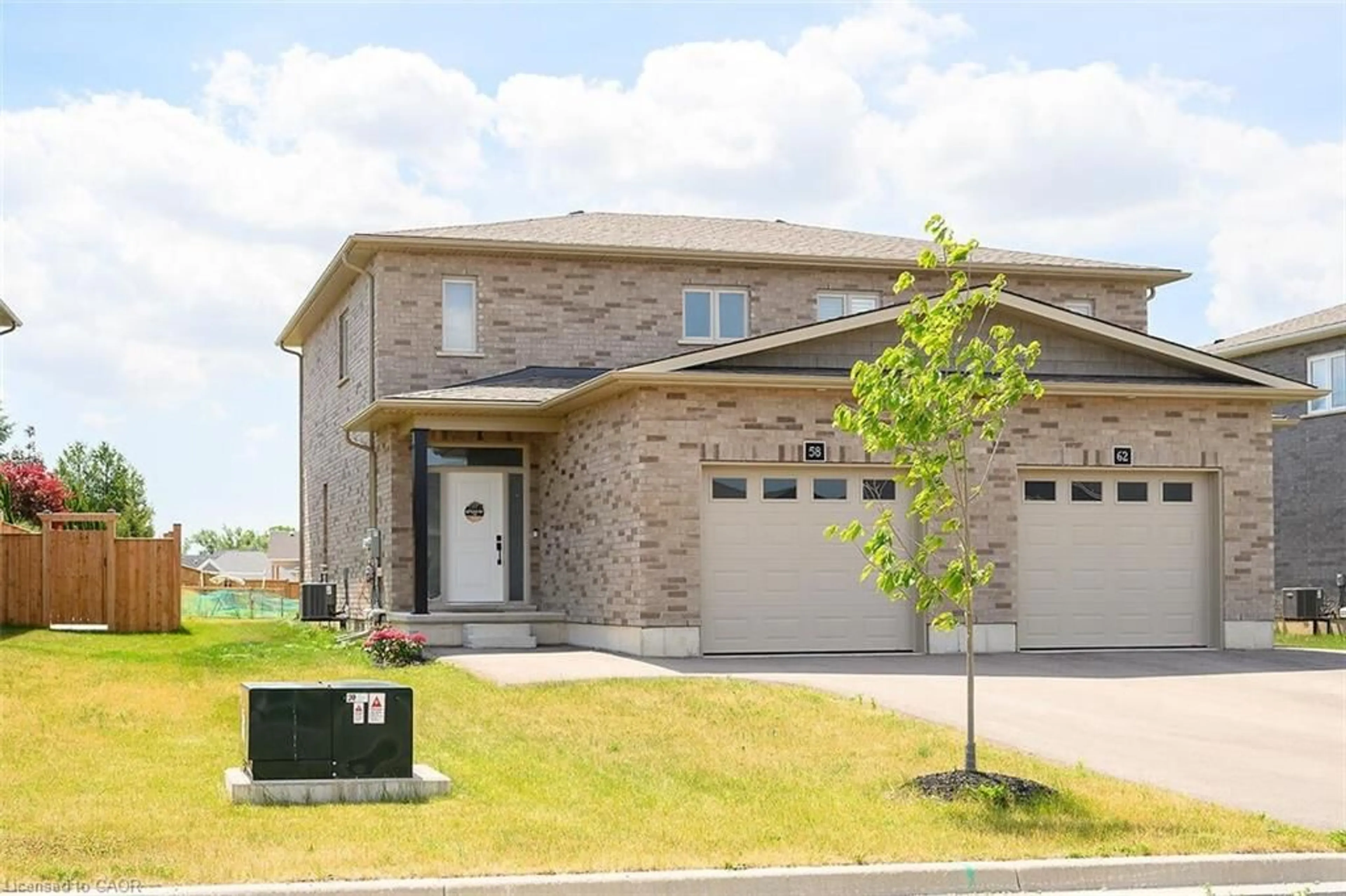 Home with brick exterior material, street for 58 Peachleaf Lane, Waterford Ontario N0E 1Y0