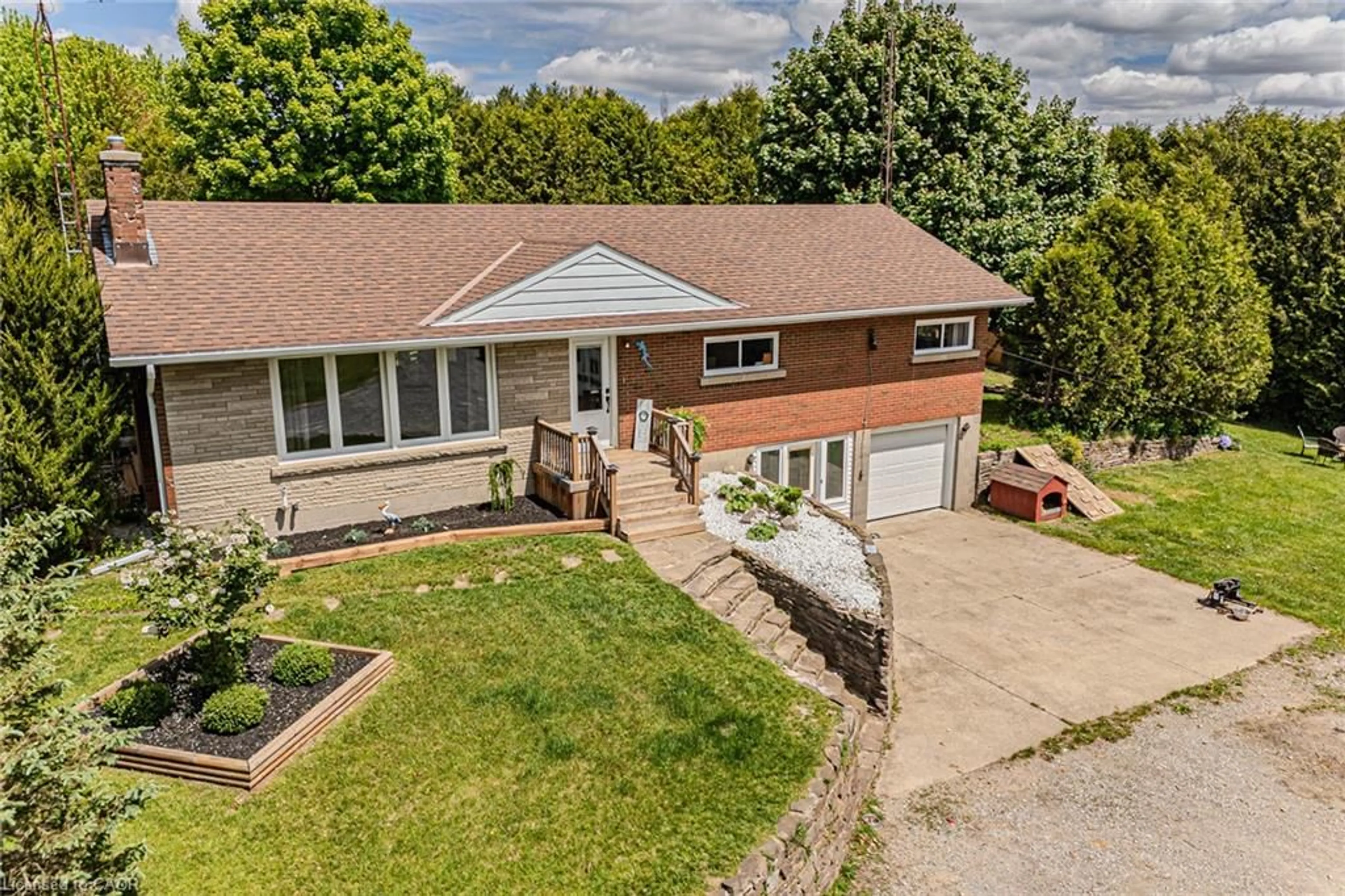 A pic from outside/outdoor area/front of a property/back of a property/a pic from drone, street for 2364 Windham West Quarterline Rd, Simcoe Ontario N3Y 4J9