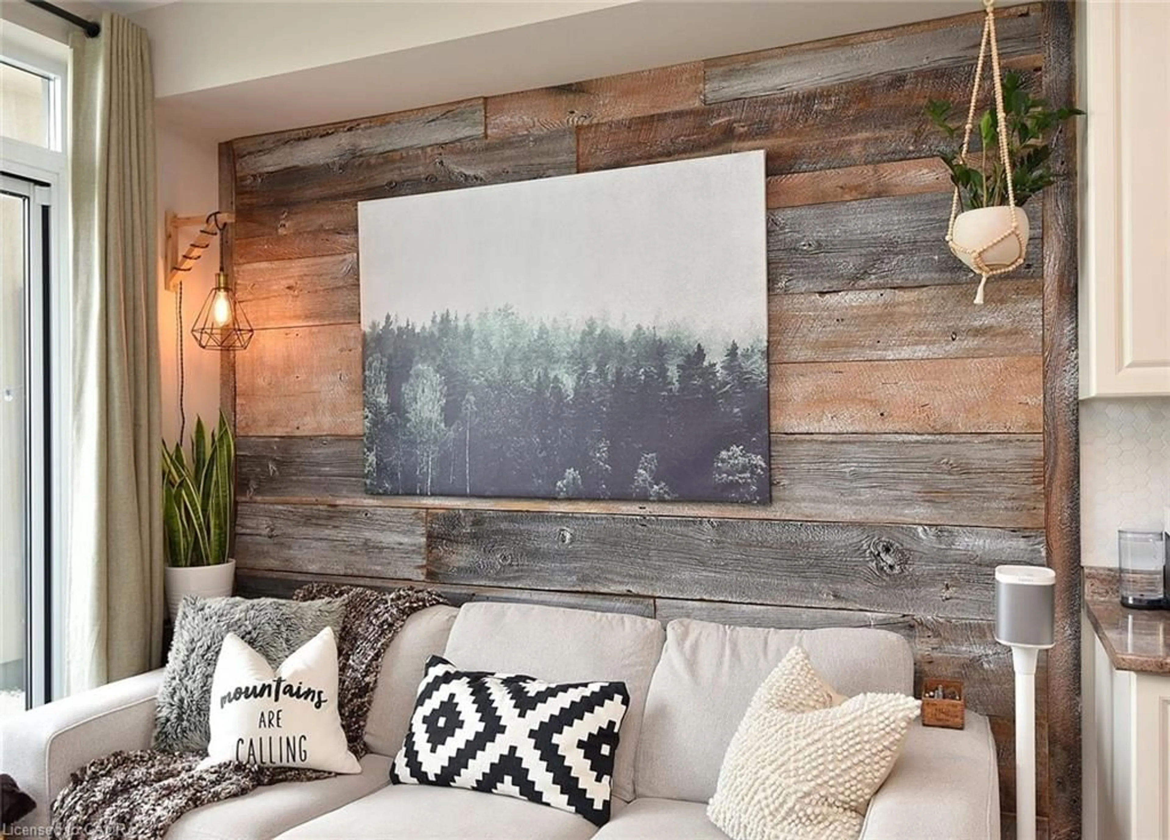 Living room with furniture, wood/laminate floor for 2486 Old Bronte Rd #317, Oakville Ontario L6M 0Y4