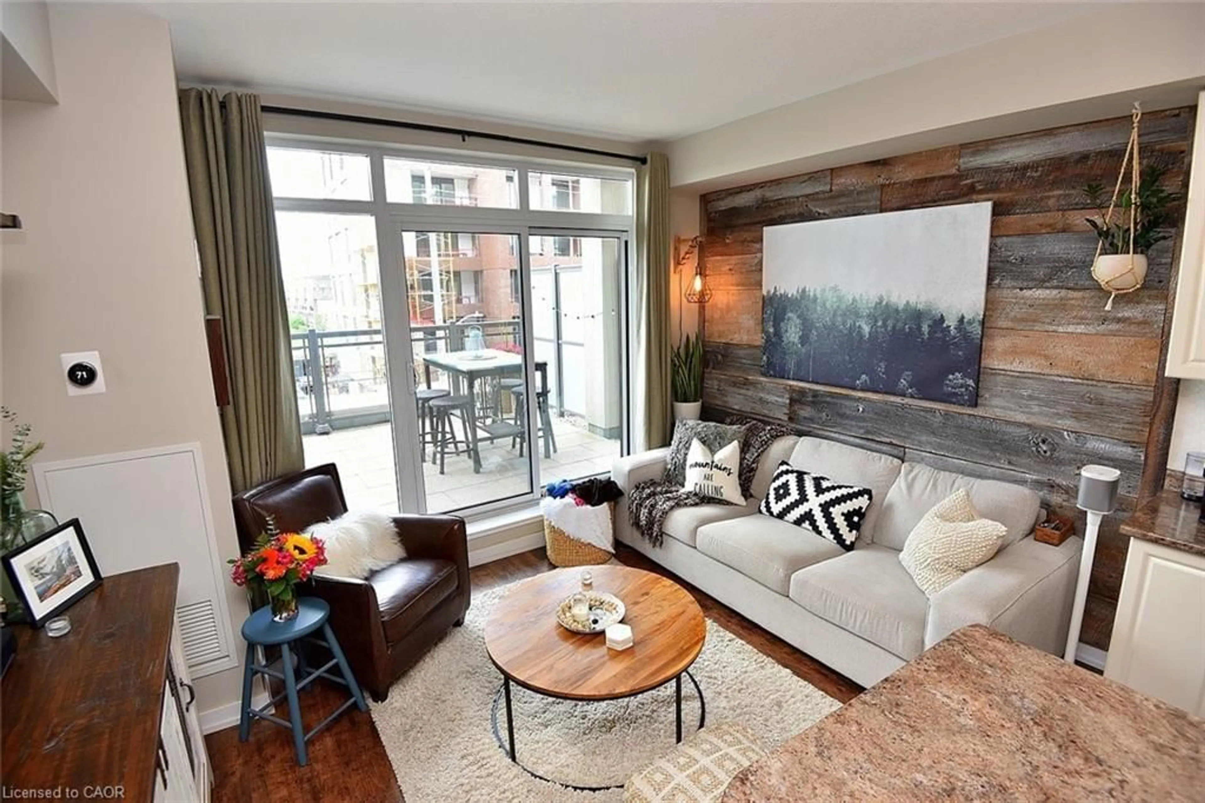 Living room with furniture, unknown for 2486 Old Bronte Rd #317, Oakville Ontario L6M 0Y4