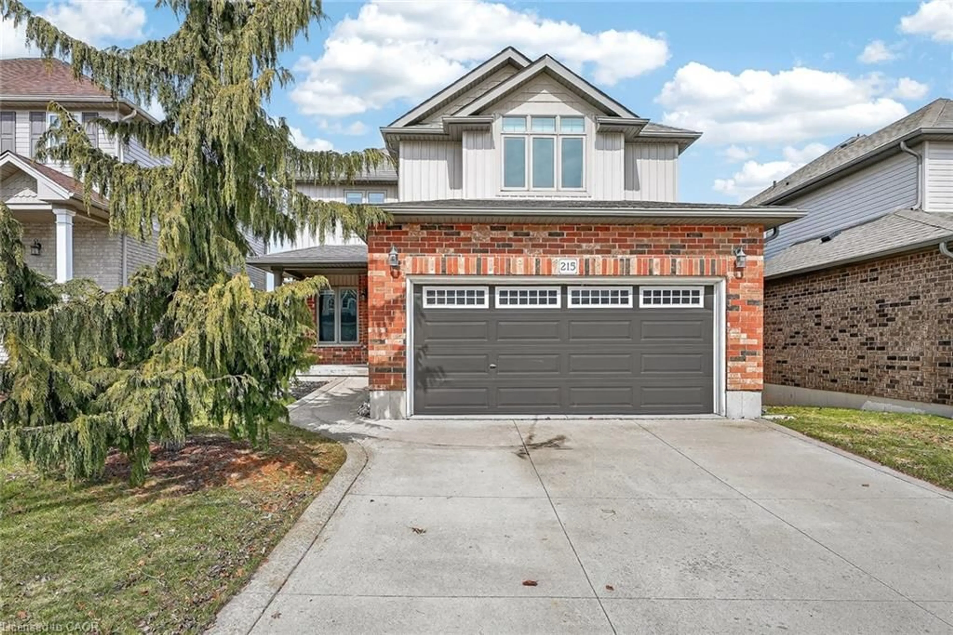 Home with brick exterior material, street for 215 Munnoch Blvd, Woodstock Ontario N4T 1V7