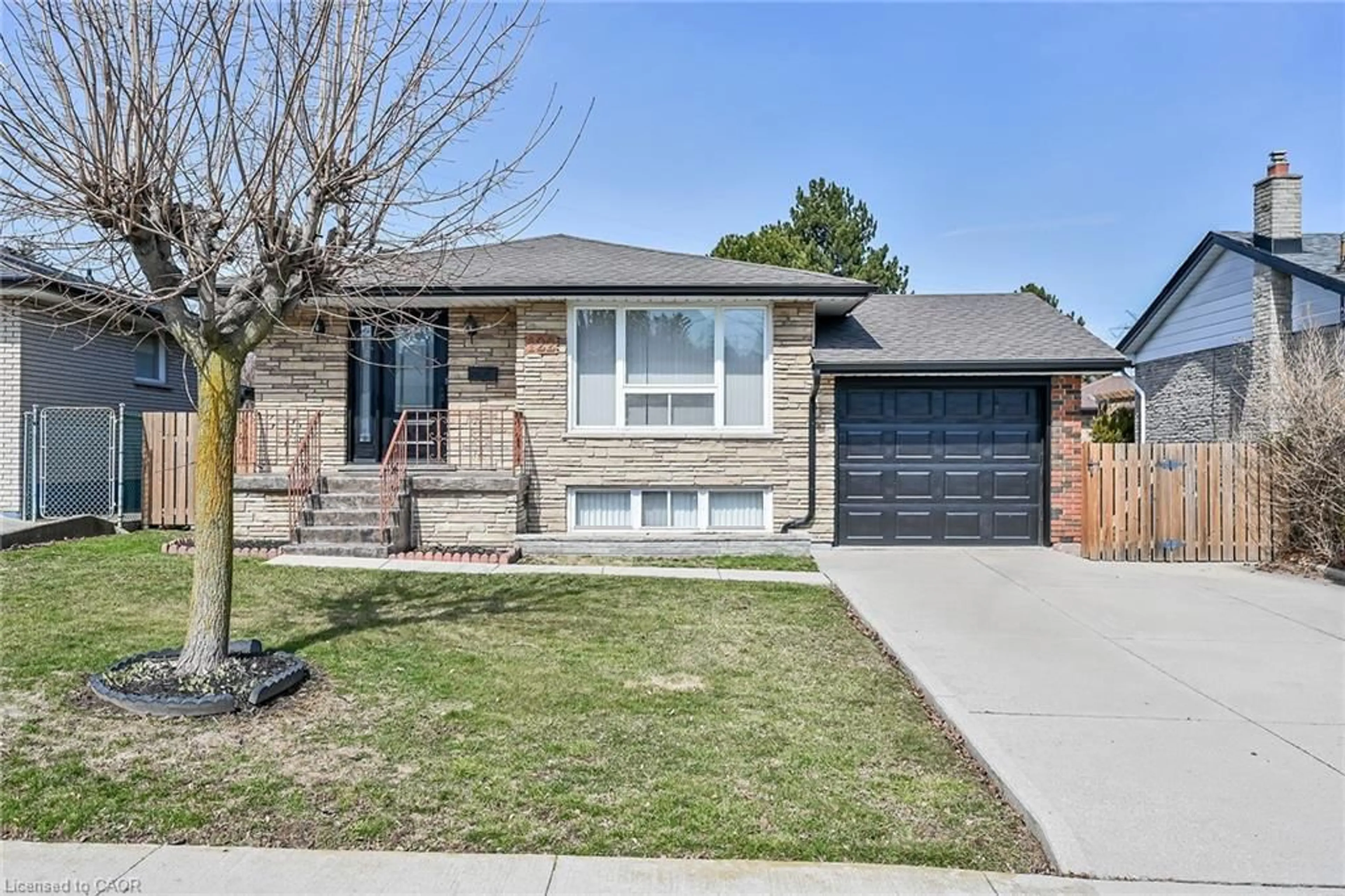 Home with brick exterior material, street for 122 Glen Forest Dr, Hamilton Ontario L8K 5Z1