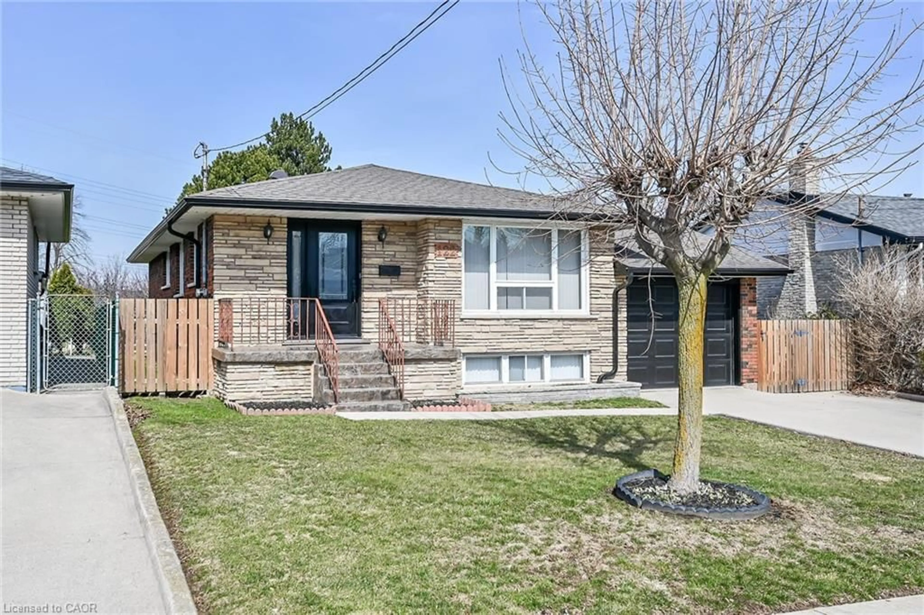 Home with brick exterior material, street for 122 Glen Forest Dr, Hamilton Ontario L8K 5Z1