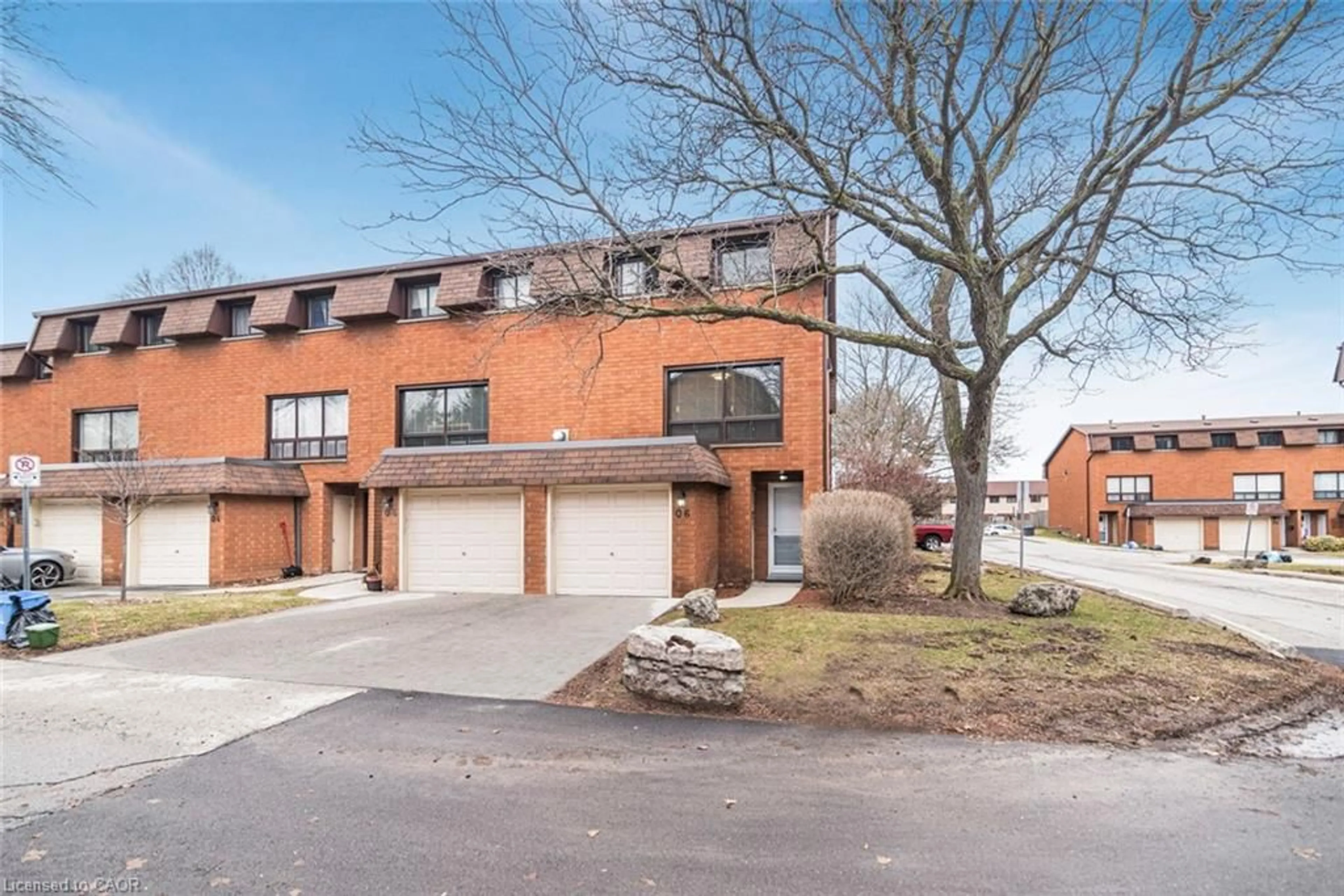 Home with brick exterior material, street for 444 Stone Church Rd #Q6, Hamilton Ontario L9B 1R1