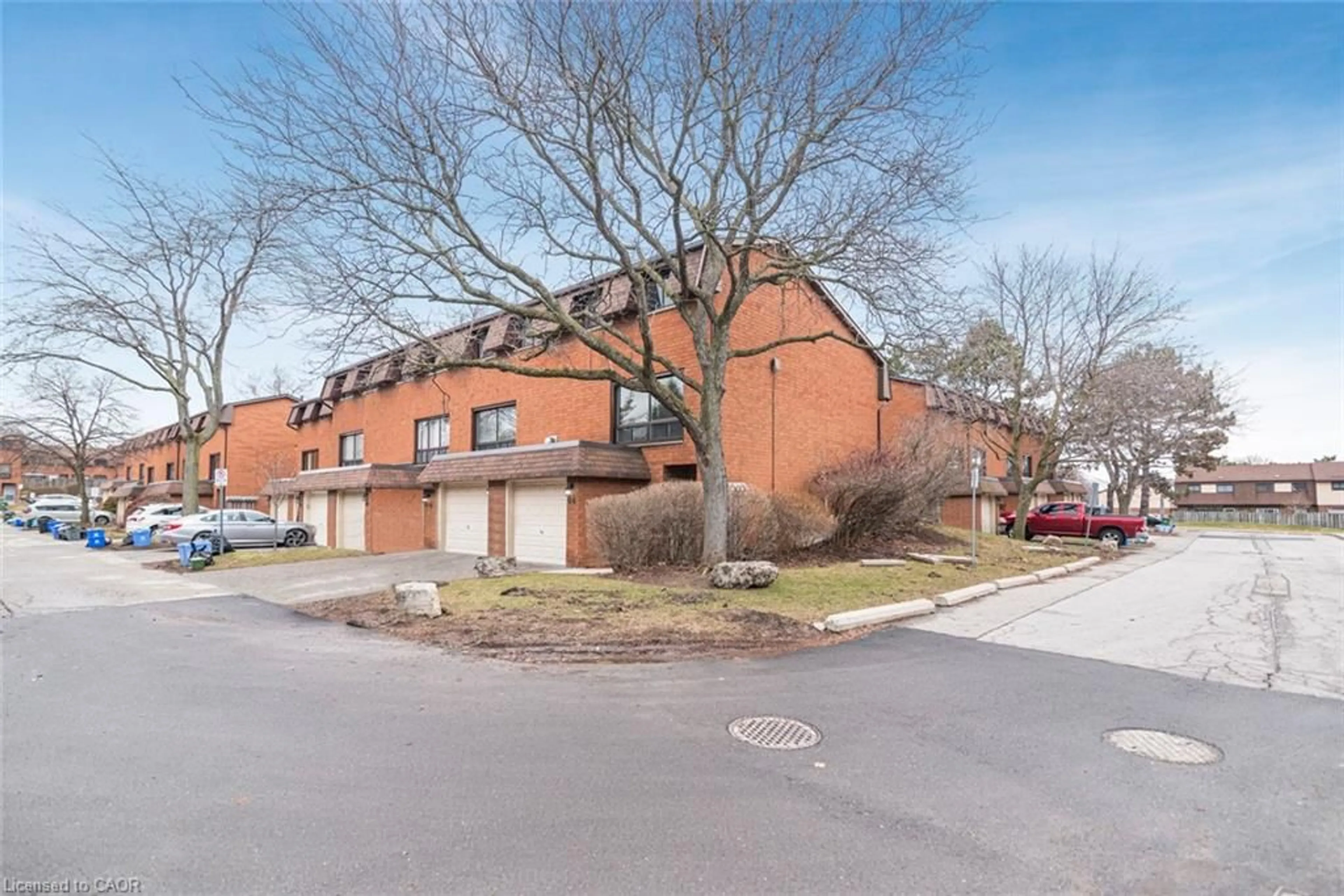 A pic from outside/outdoor area/front of a property/back of a property/a pic from drone, street for 444 Stone Church Rd #Q6, Hamilton Ontario L9B 1R1