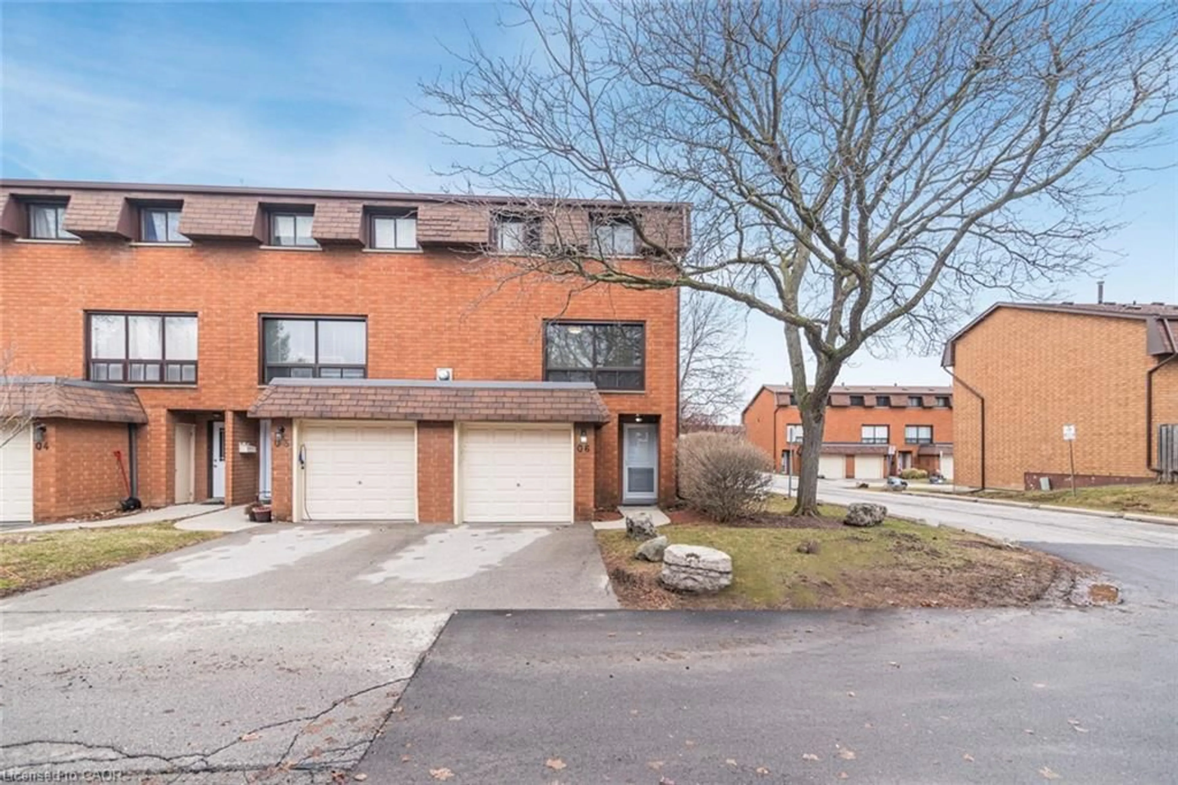 Home with brick exterior material, street for 444 Stone Church Rd #Q6, Hamilton Ontario L9B 1R1