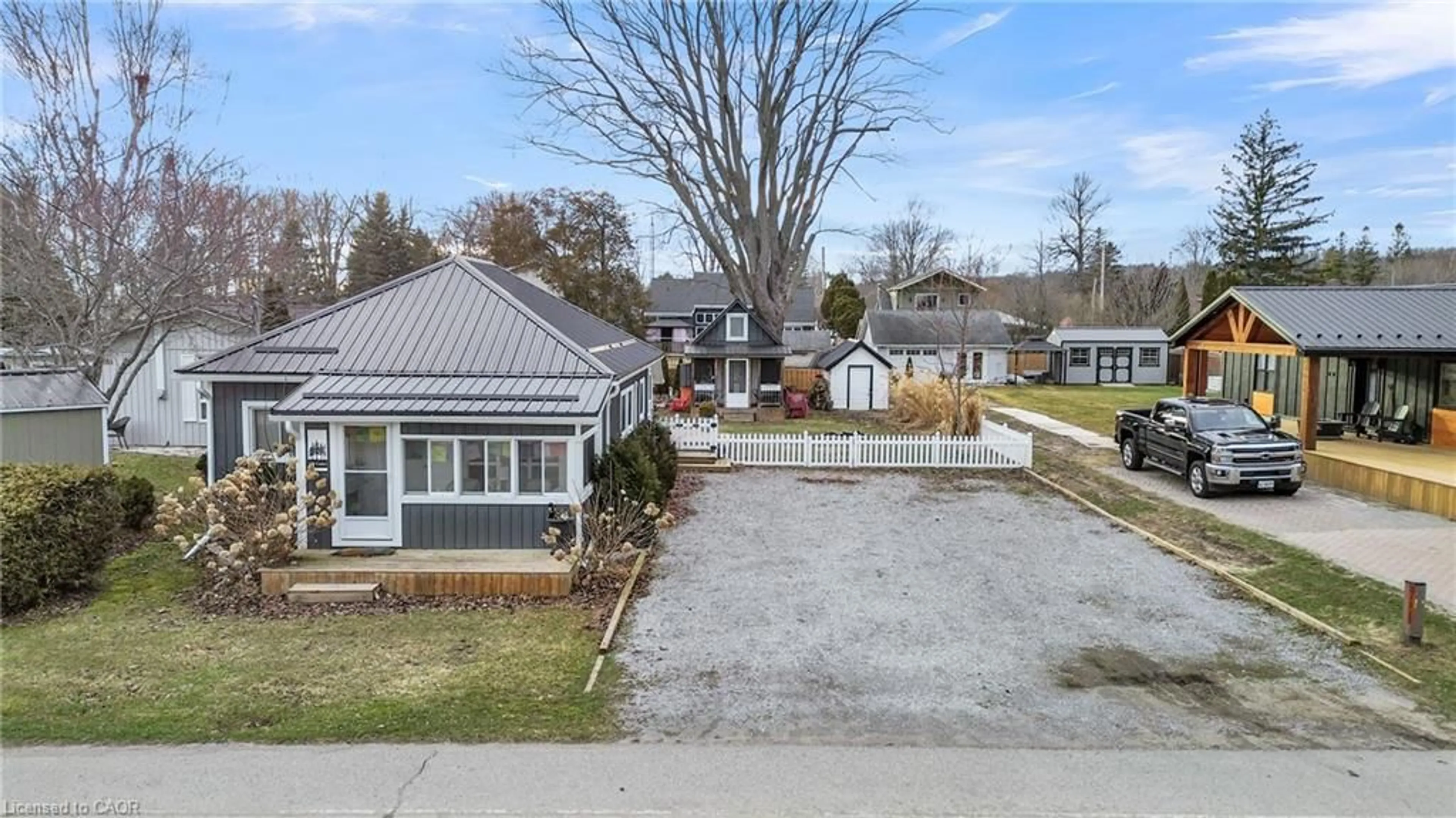A pic from outside/outdoor area/front of a property/back of a property/a pic from drone, street for 179 Cedar Dr, Turkey Point Ontario N0E 1T0