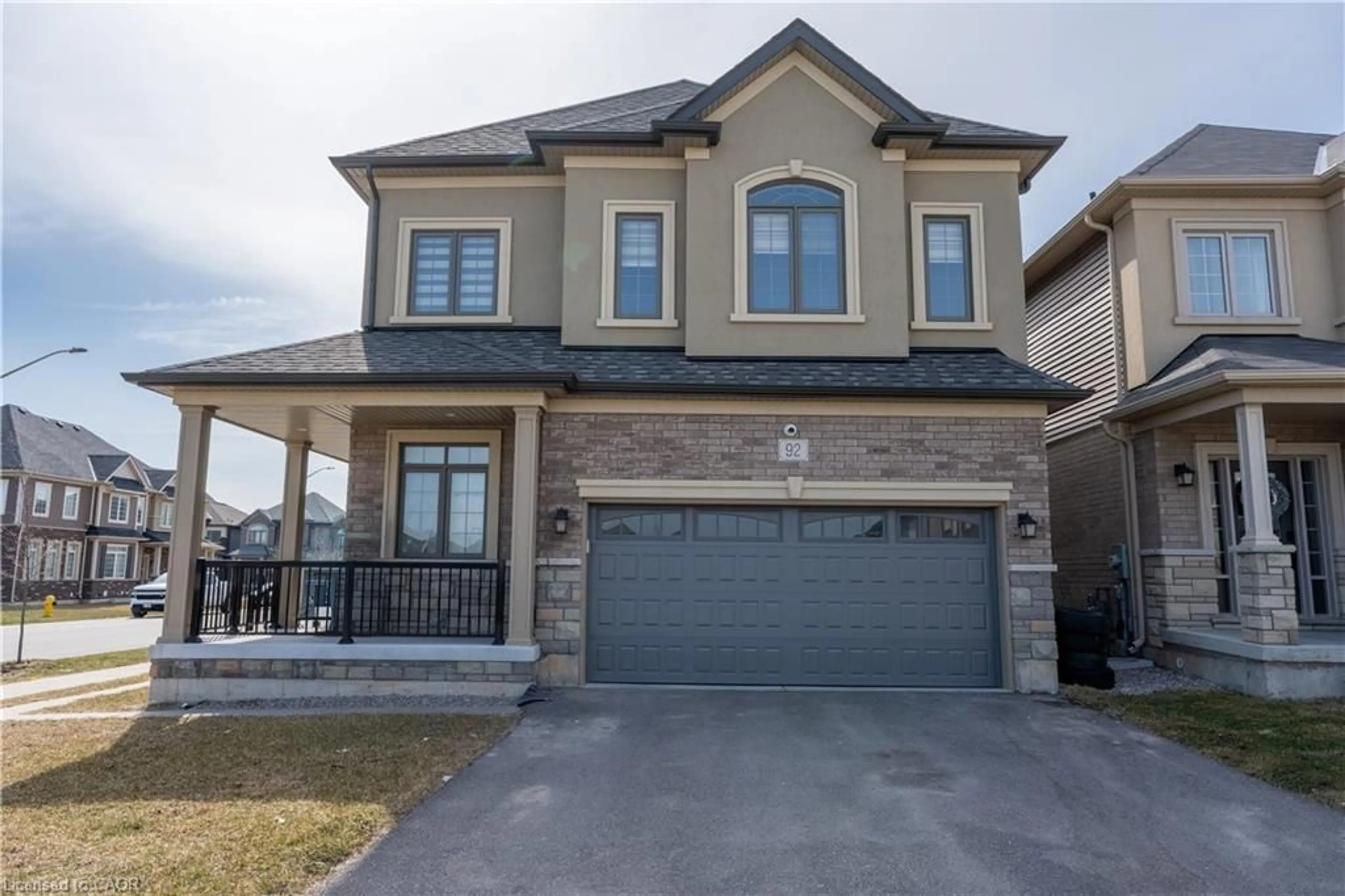 Home with brick exterior material, street for 92 Scenic Ridge Gate, Paris Ontario N3L 3E3
