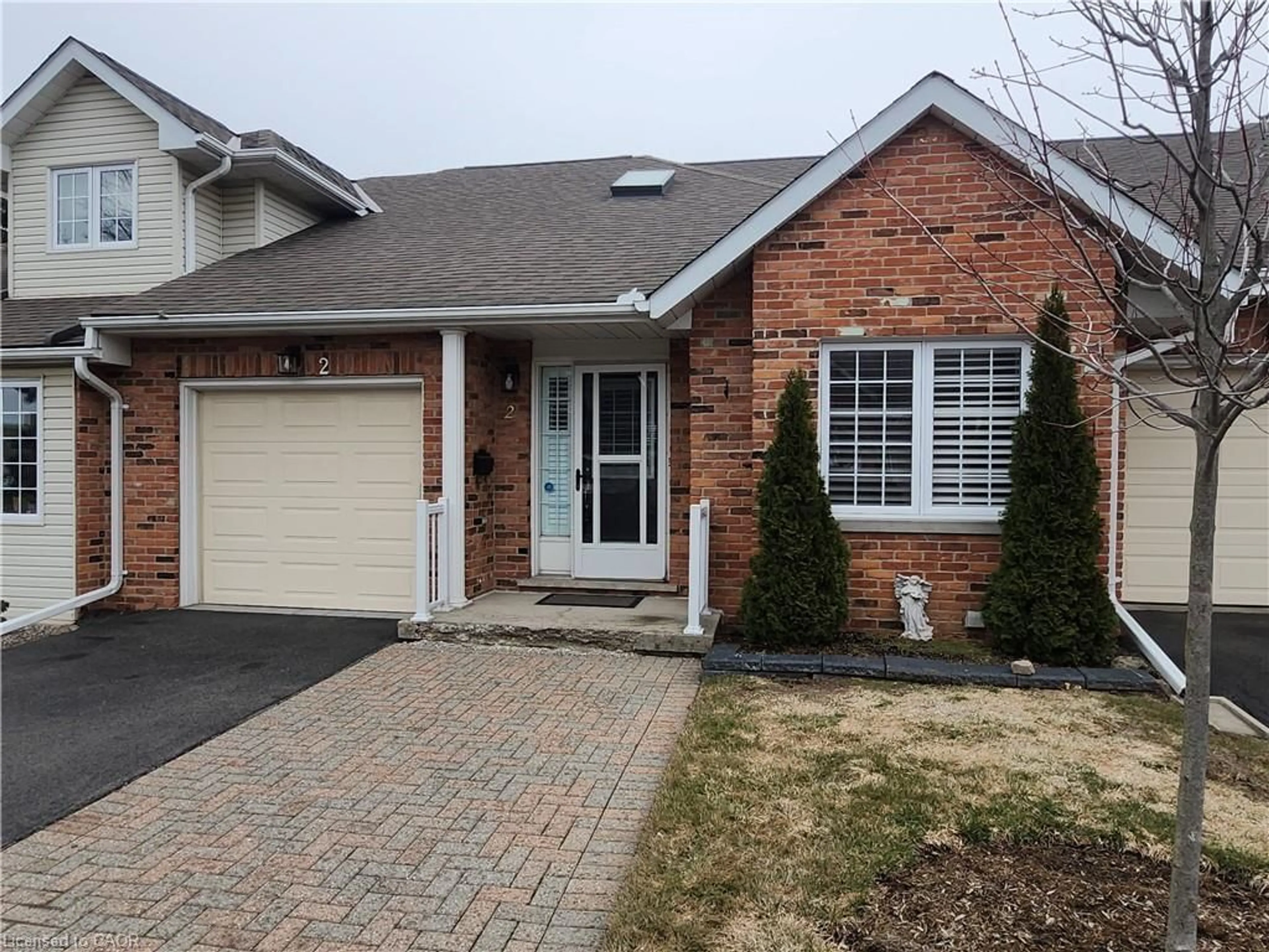 Home with brick exterior material, street for 810 Golf Links Rd #2, Ancaster Ontario L9K 1J2