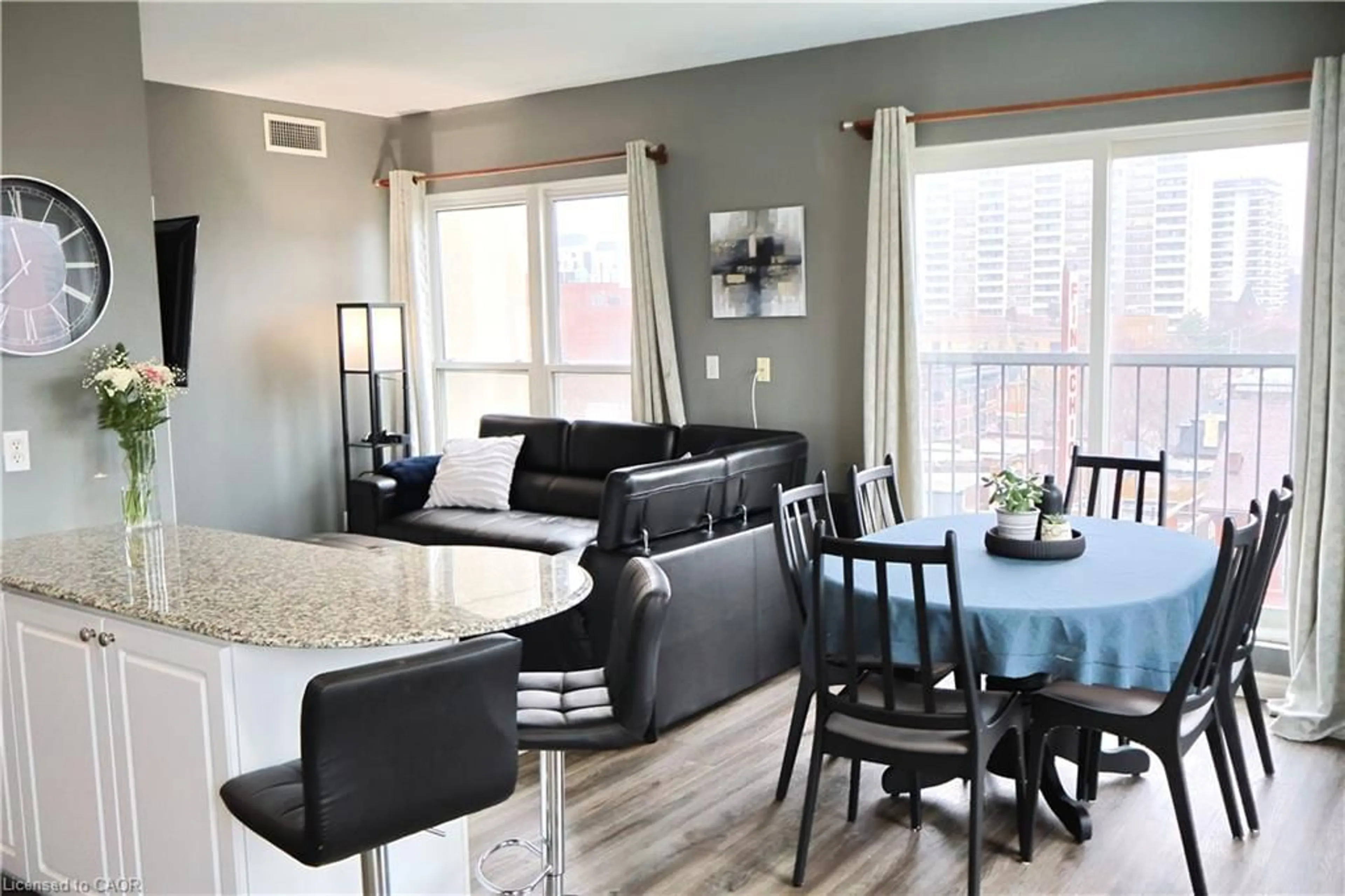 Open concept kitchen, wood/laminate floor for 135 James St #701, Hamilton Ontario L8P 2Z6