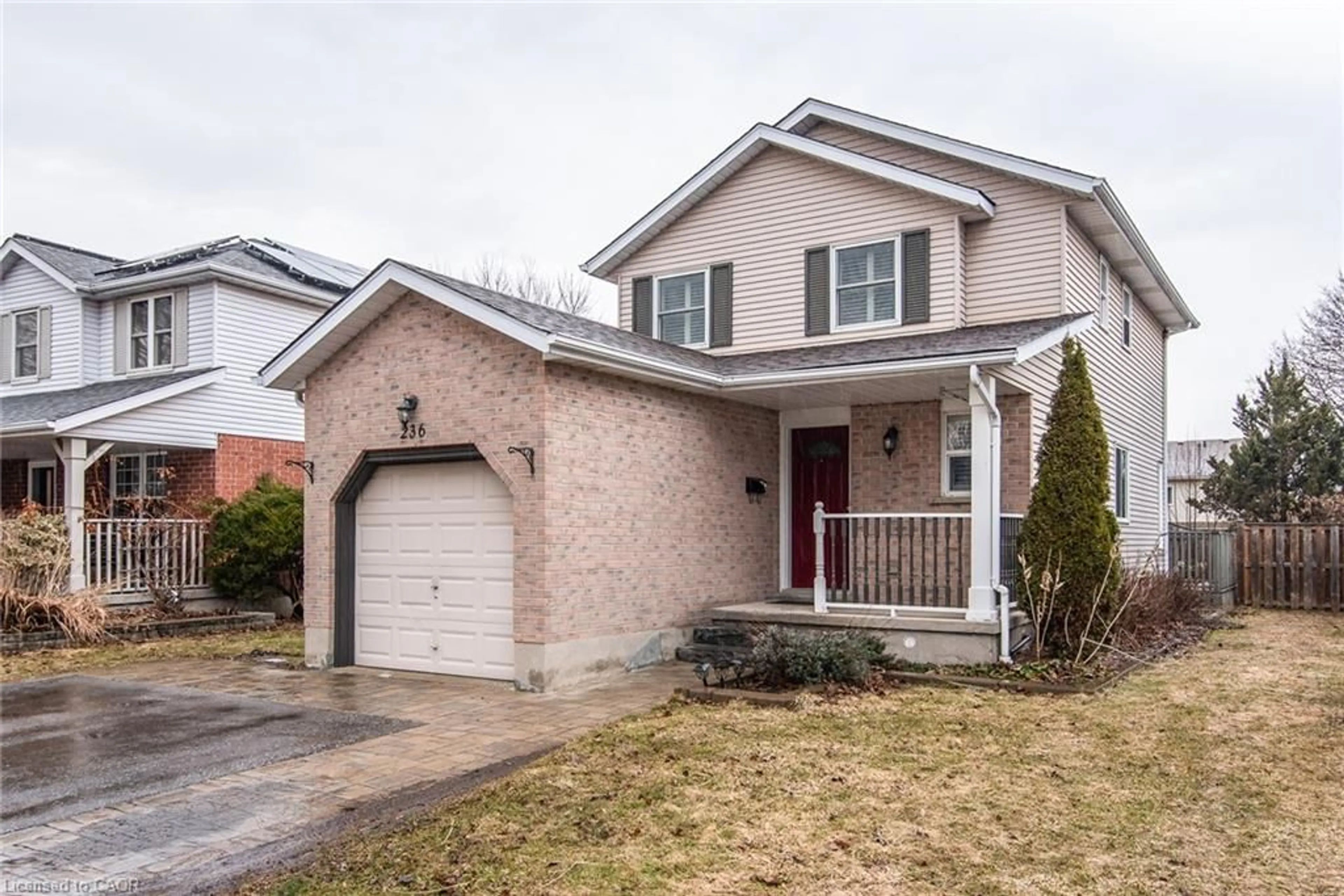 Home with brick exterior material, street for 236 Dartmoor Cres, Waterloo Ontario N2K 2S9