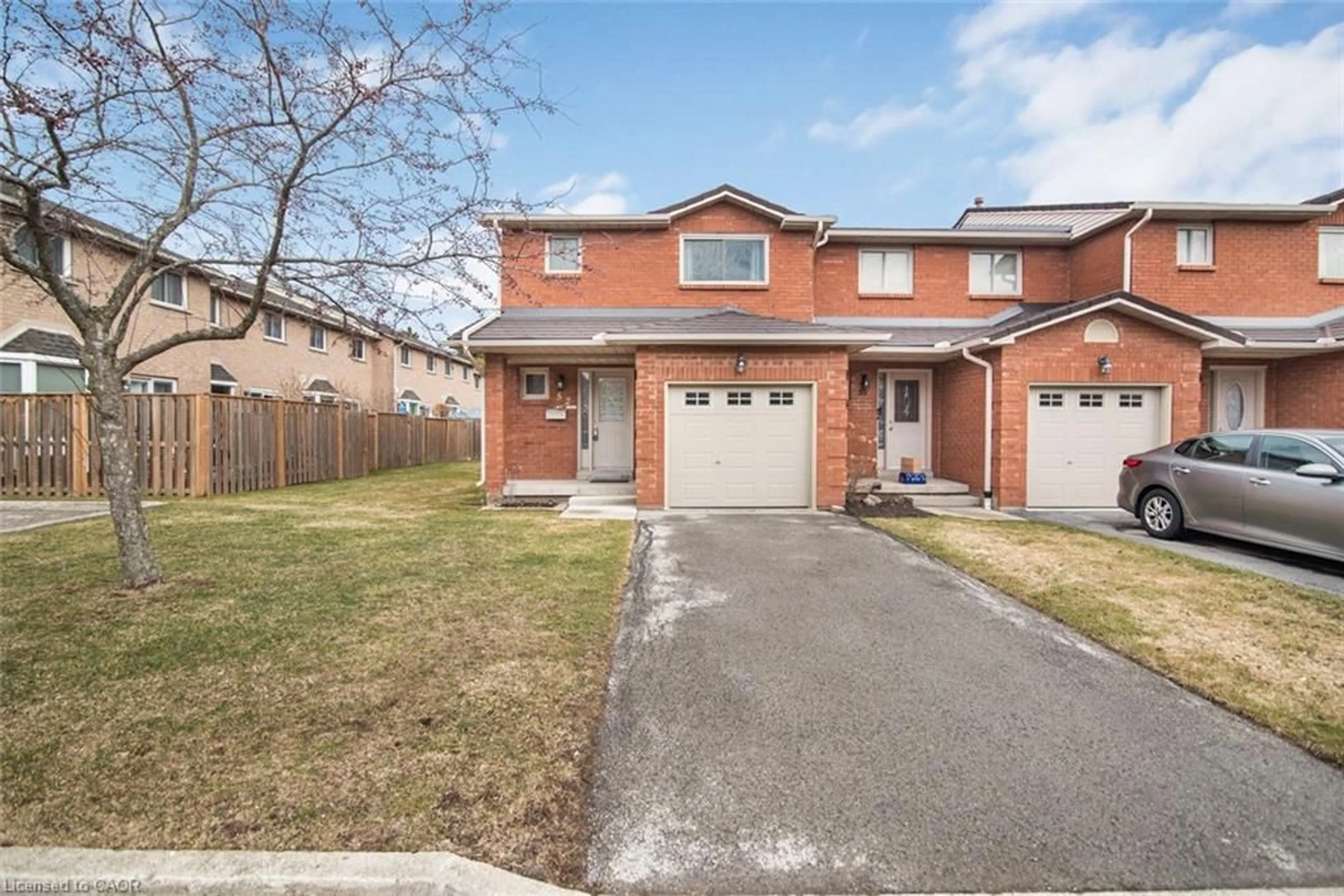 Home with brick exterior material, street for 391 Stone Church Rd #52, Hamilton Ontario L9B 2H2