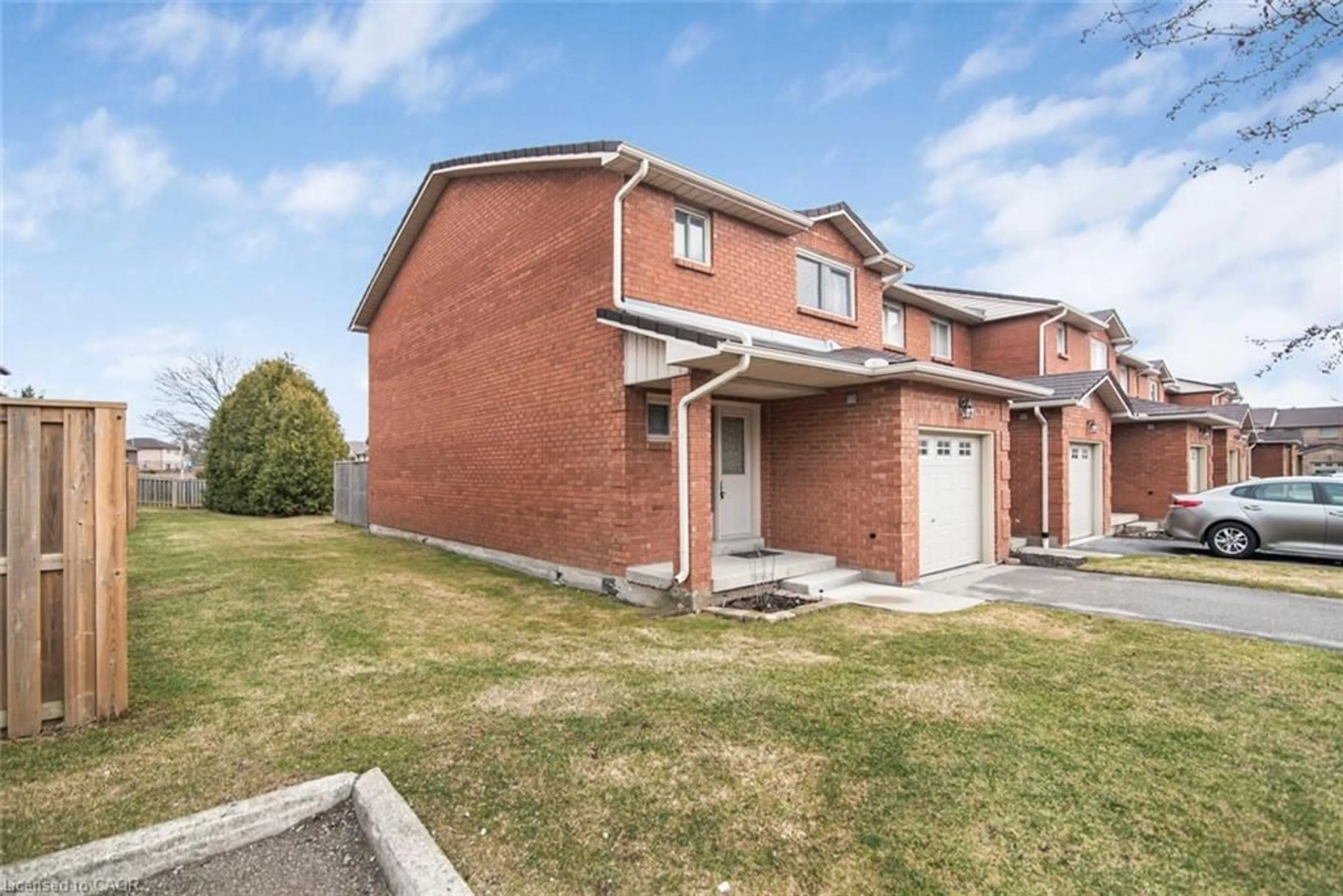 Home with brick exterior material, street for 391 Stone Church Rd #52, Hamilton Ontario L9B 2H2