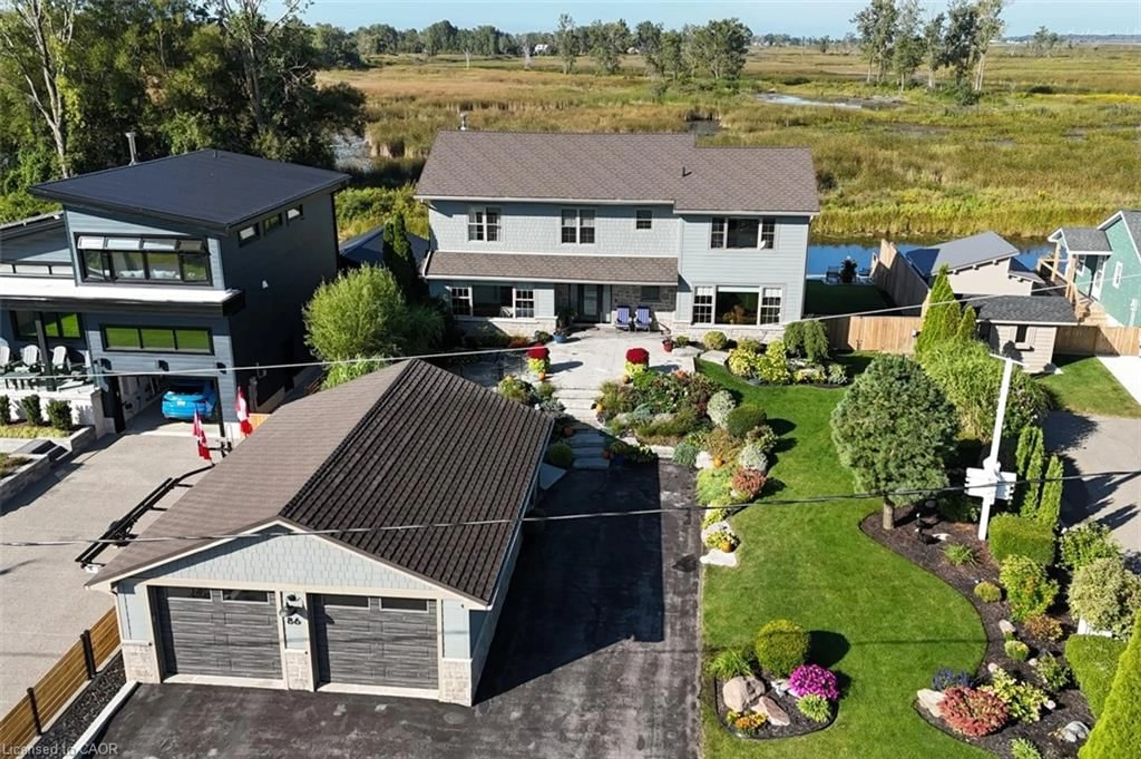 A pic from outside/outdoor area/front of a property/back of a property/a pic from drone, unknown for 86 Old Cut Blvd, Long Point Ontario N0E 1M0