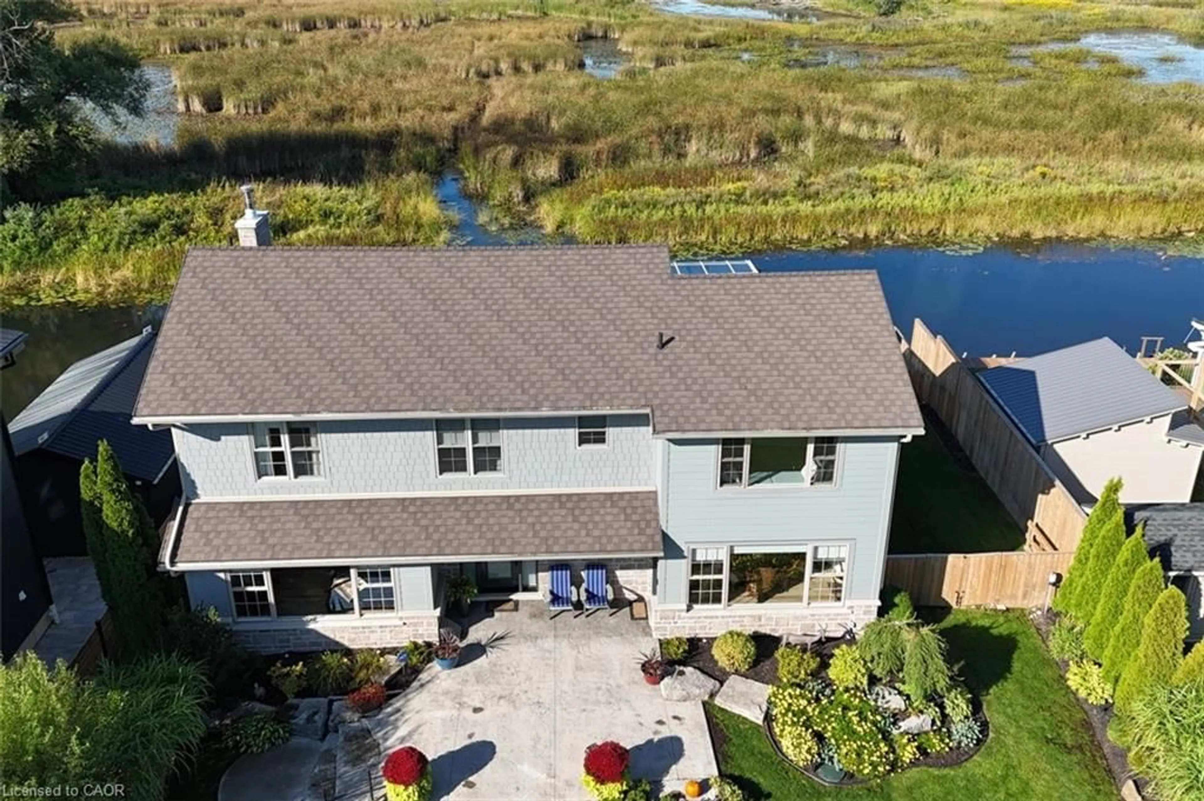 A pic from outside/outdoor area/front of a property/back of a property/a pic from drone, water/lake/river/ocean view for 86 Old Cut Blvd, Long Point Ontario N0E 1M0