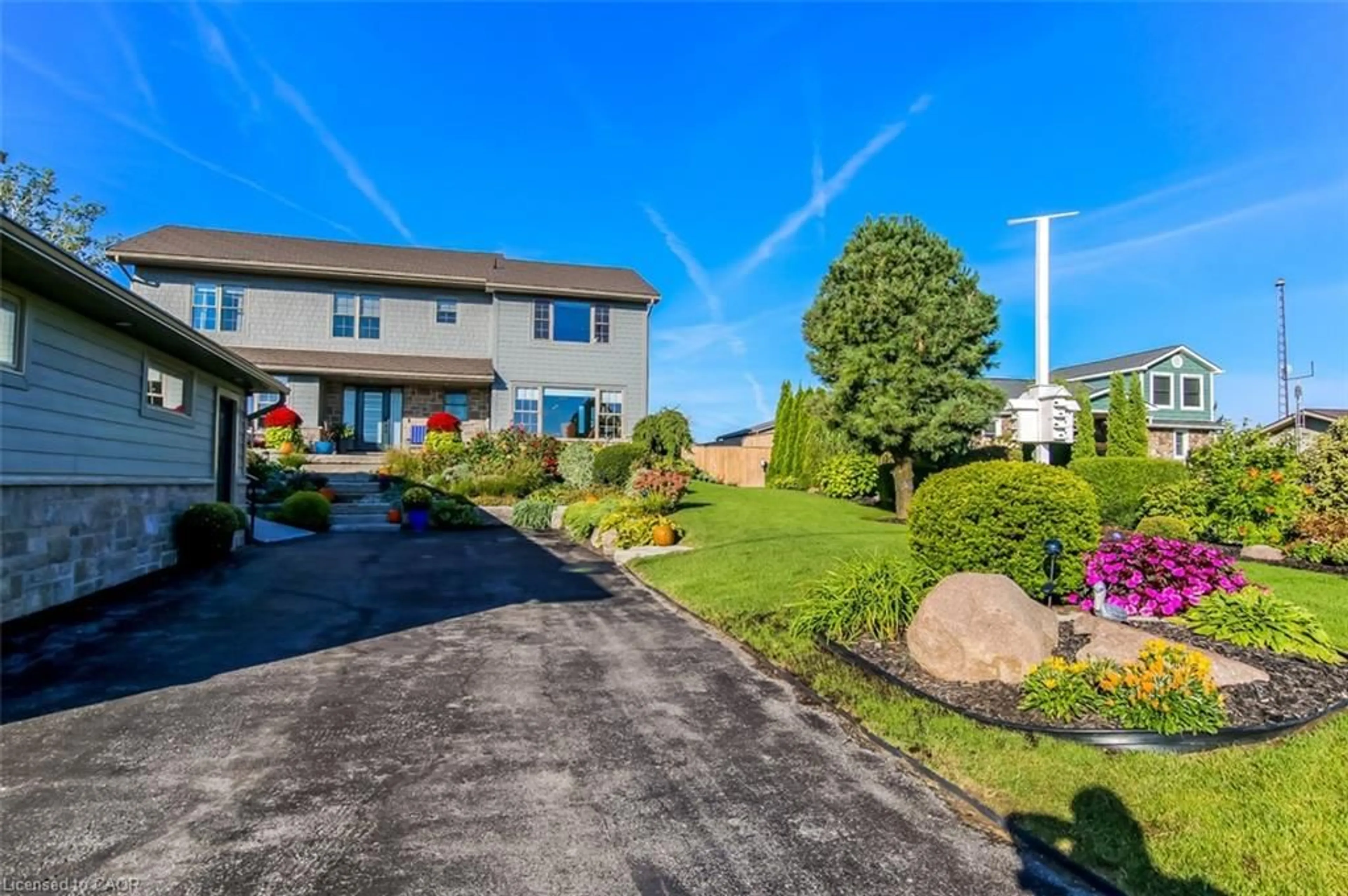 A pic from outside/outdoor area/front of a property/back of a property/a pic from drone, water/lake/river/ocean view for 86 Old Cut Blvd, Long Point Ontario N0E 1M0
