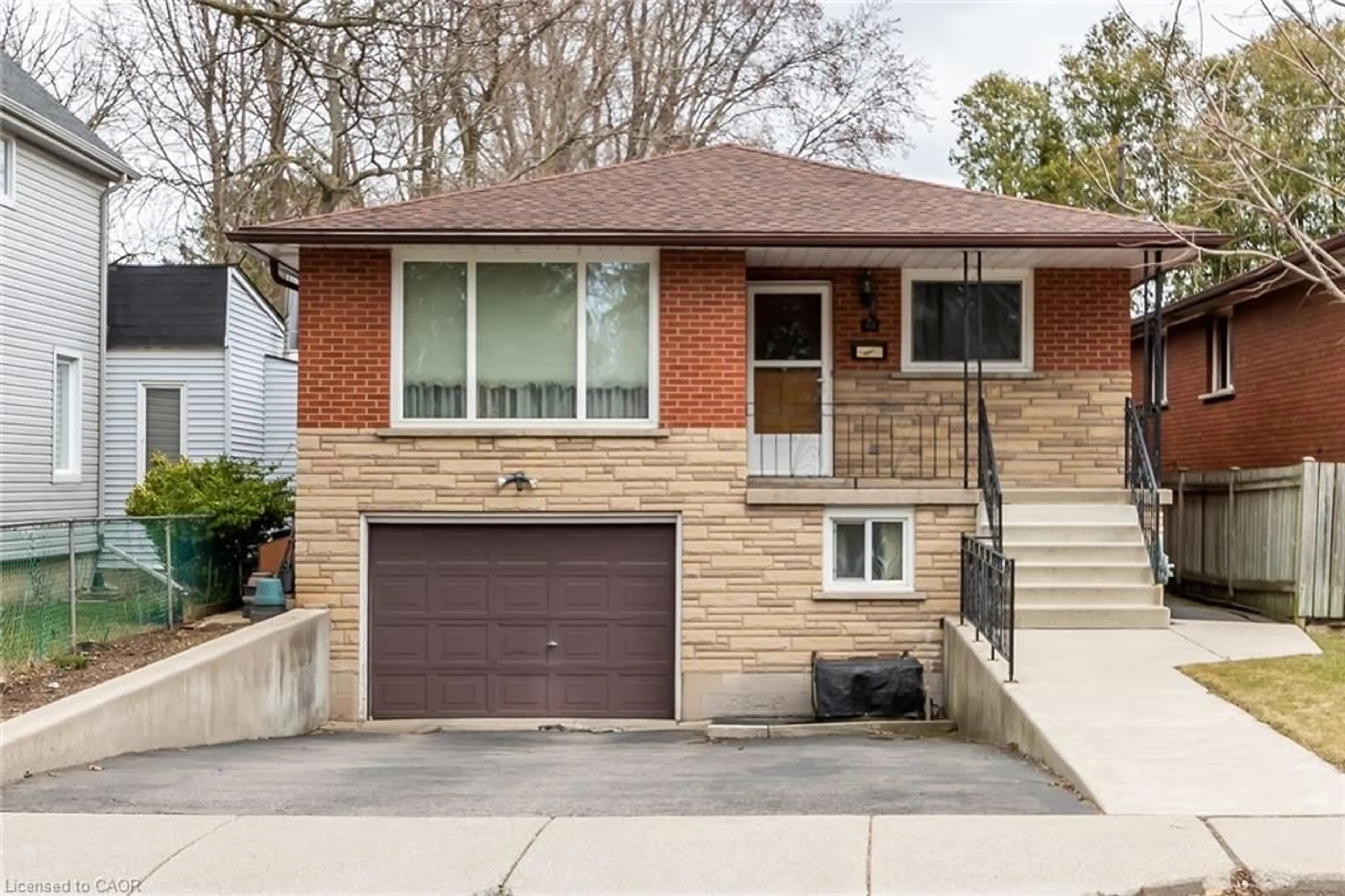 Home with brick exterior material, street for 45 Leland St, Hamilton Ontario L8S 2Z9