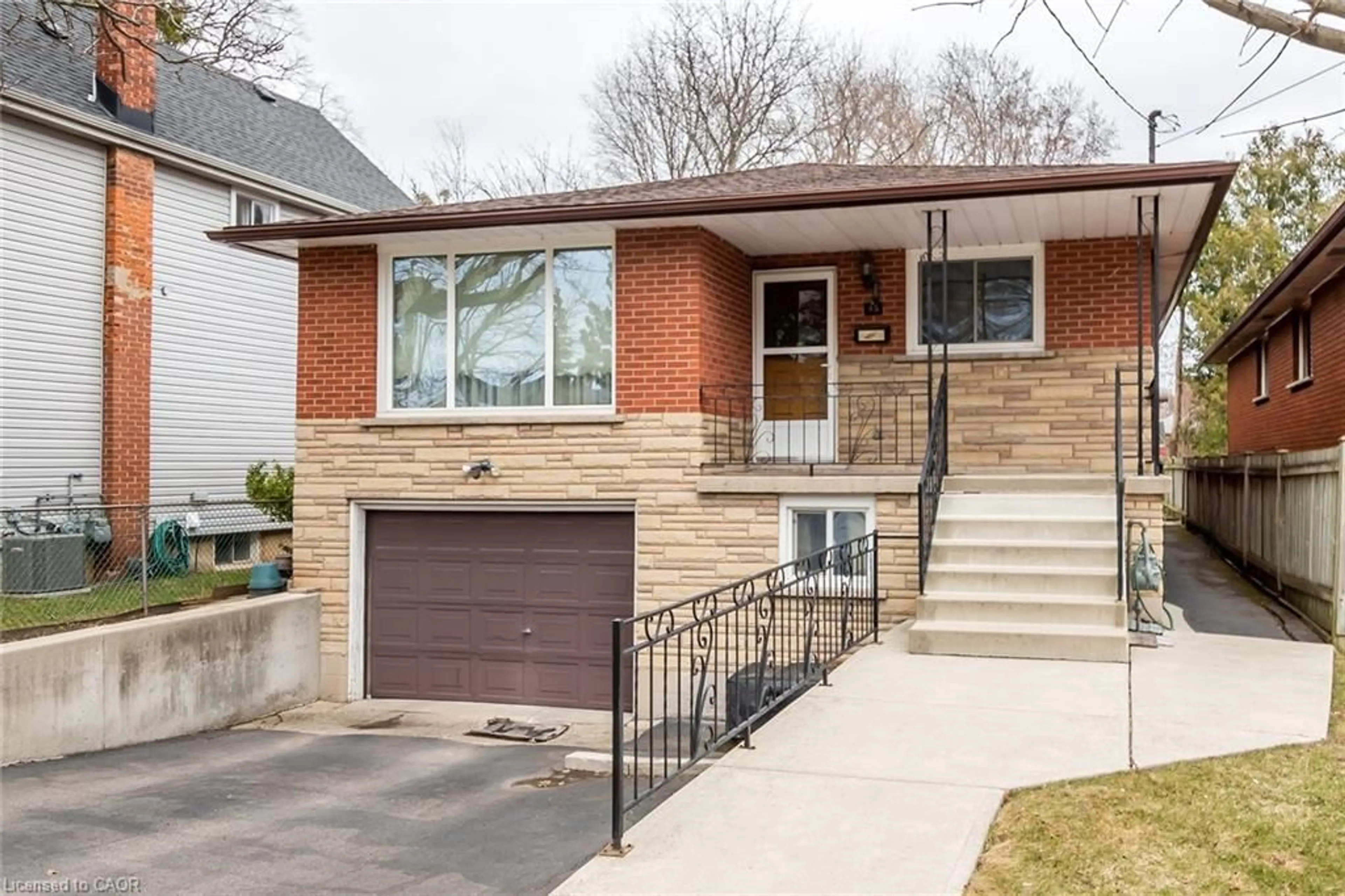 Home with brick exterior material, street for 45 Leland St, Hamilton Ontario L8S 2Z9