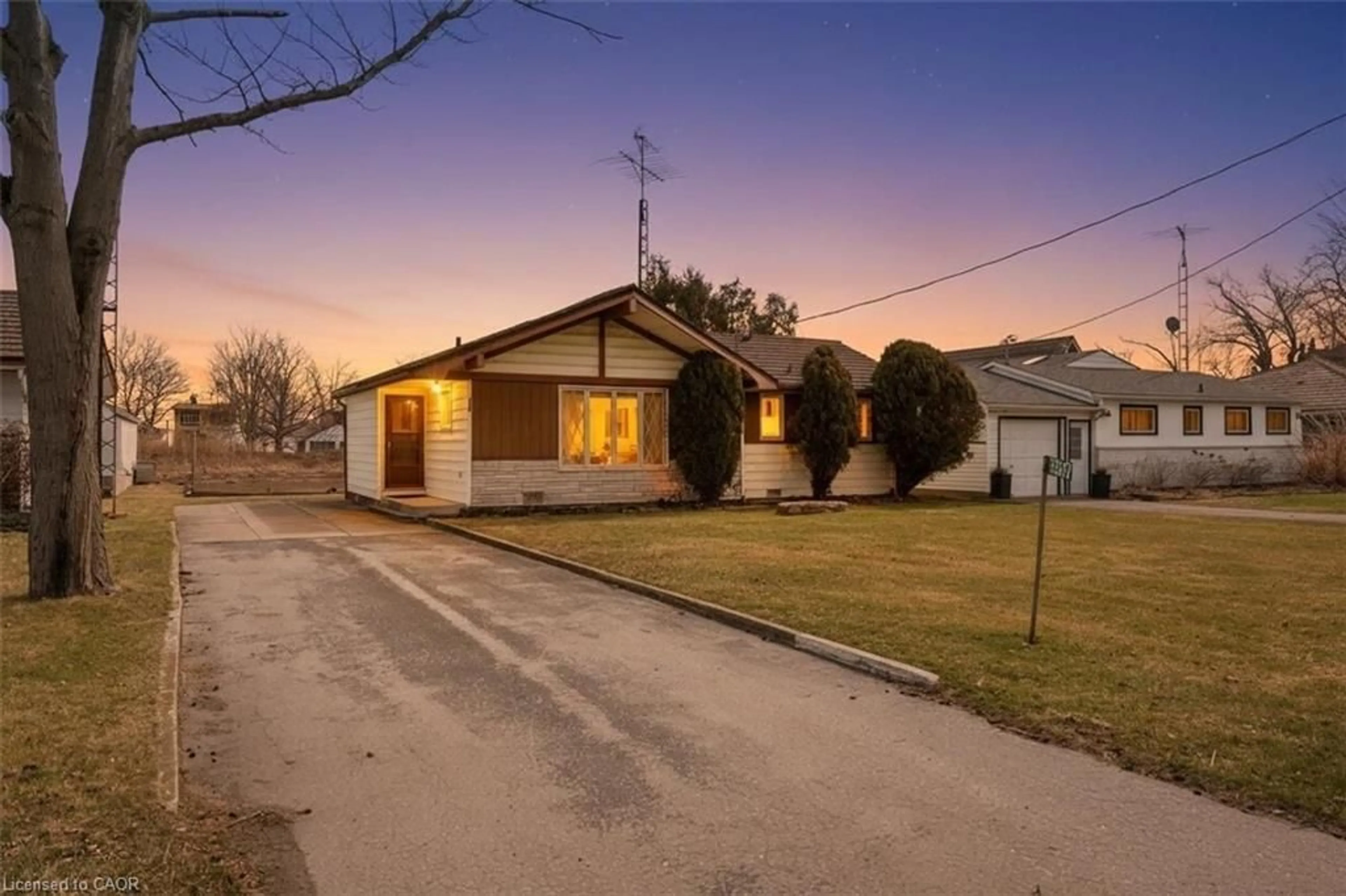 A pic from outside/outdoor area/front of a property/back of a property/a pic from drone, street for 380 Cedar Dr, Turkey Point Ontario N6G 1E7