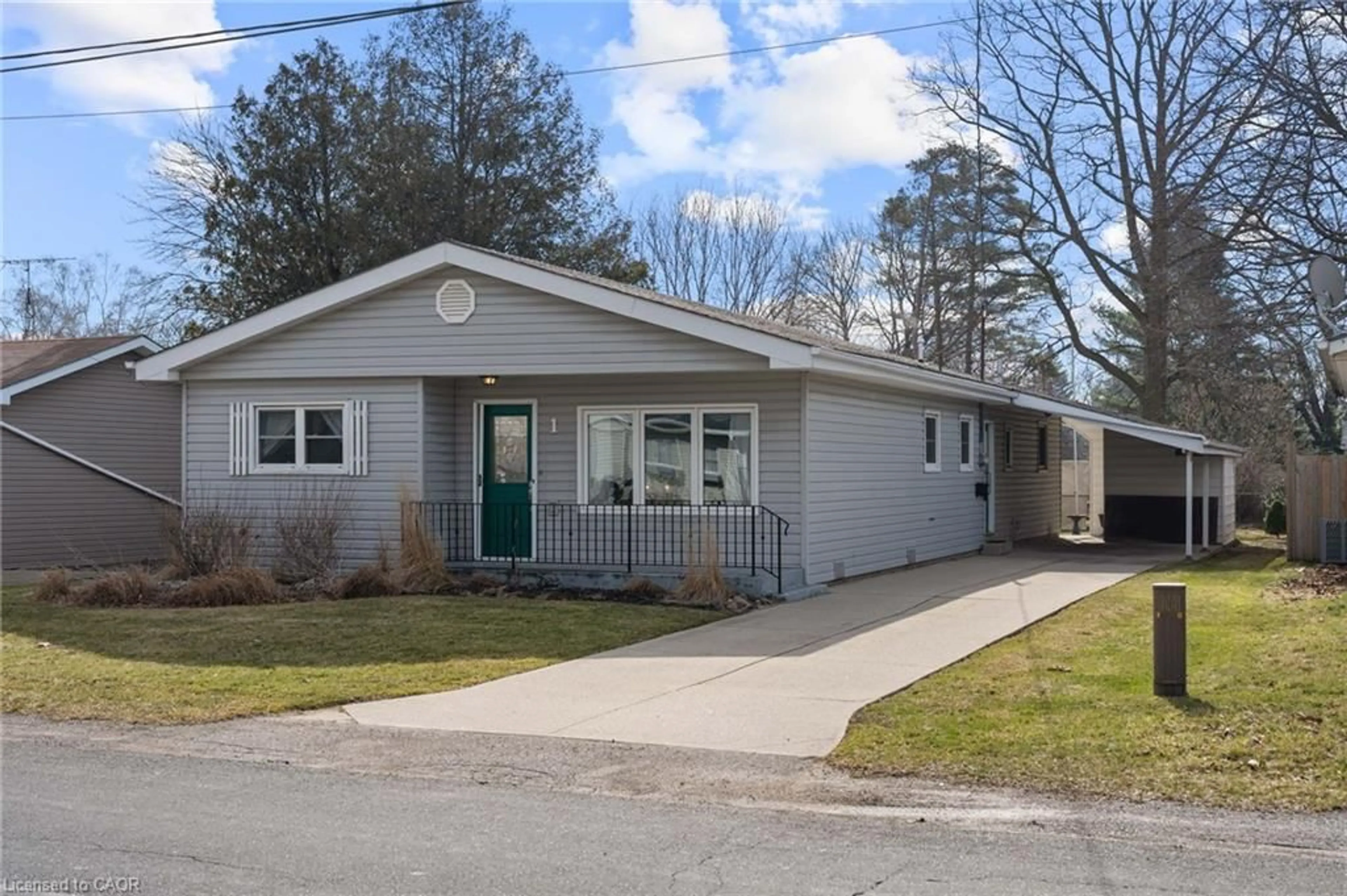 Home with vinyl exterior material, street for 1 Clifford St, Port Dover Ontario N0A 1N0