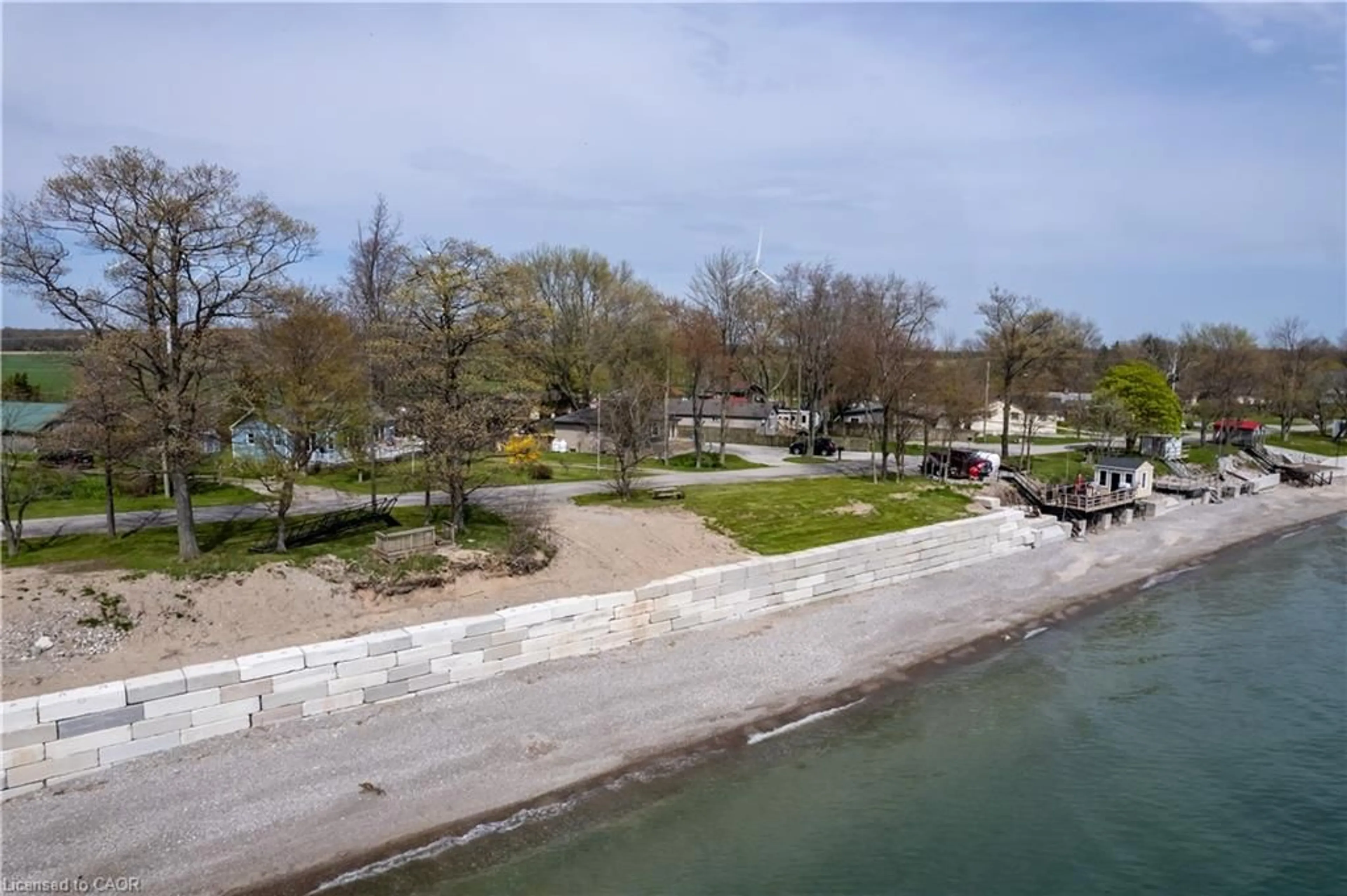 A pic from outside/outdoor area/front of a property/back of a property/a pic from drone, water/lake/river/ocean view for 557 Edgewater Pl, Dunnville Ontario N1A 2W8