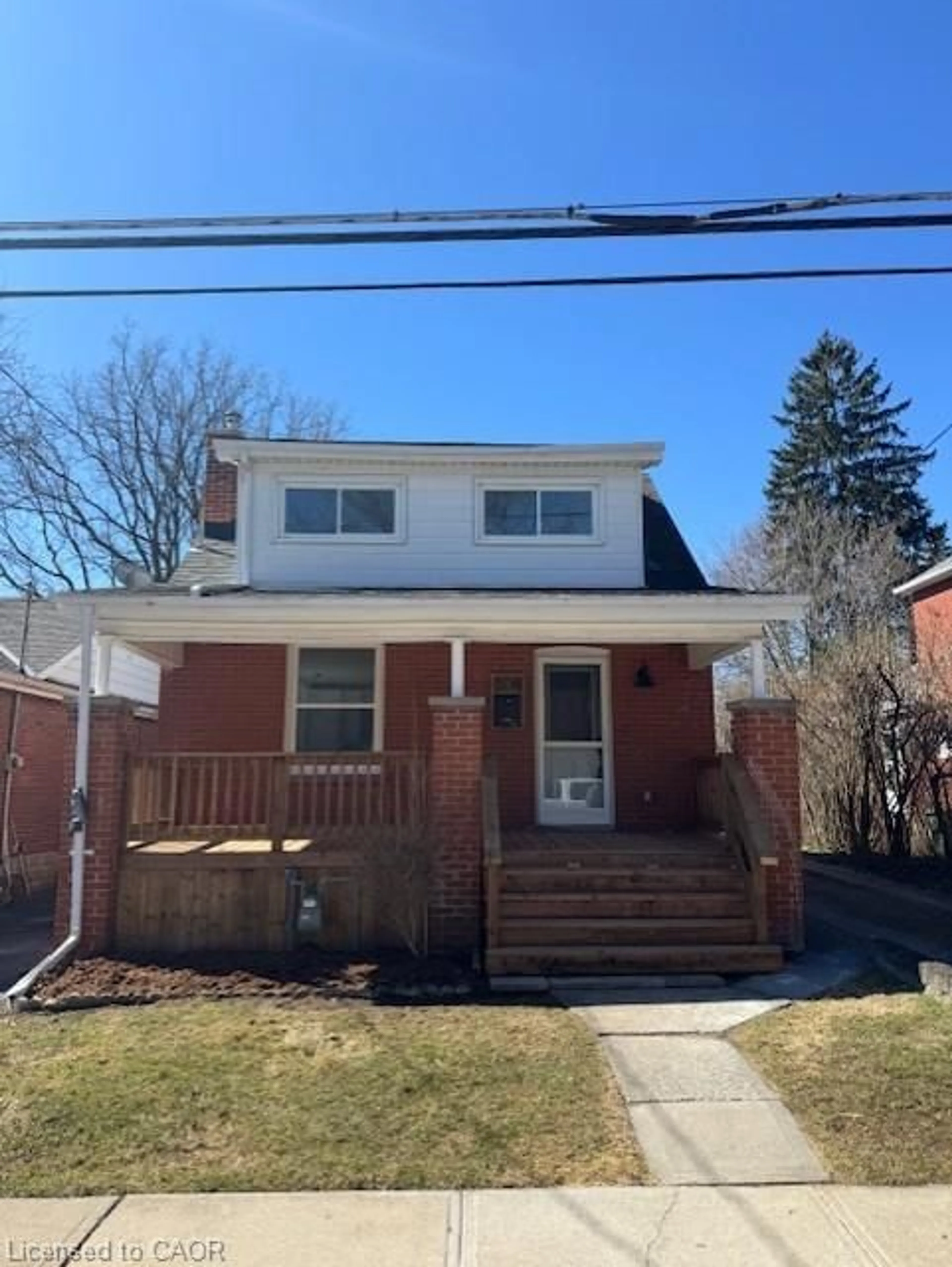 Home with brick exterior material, street for 304 Park St, Hamilton Ontario L9H 1Y9