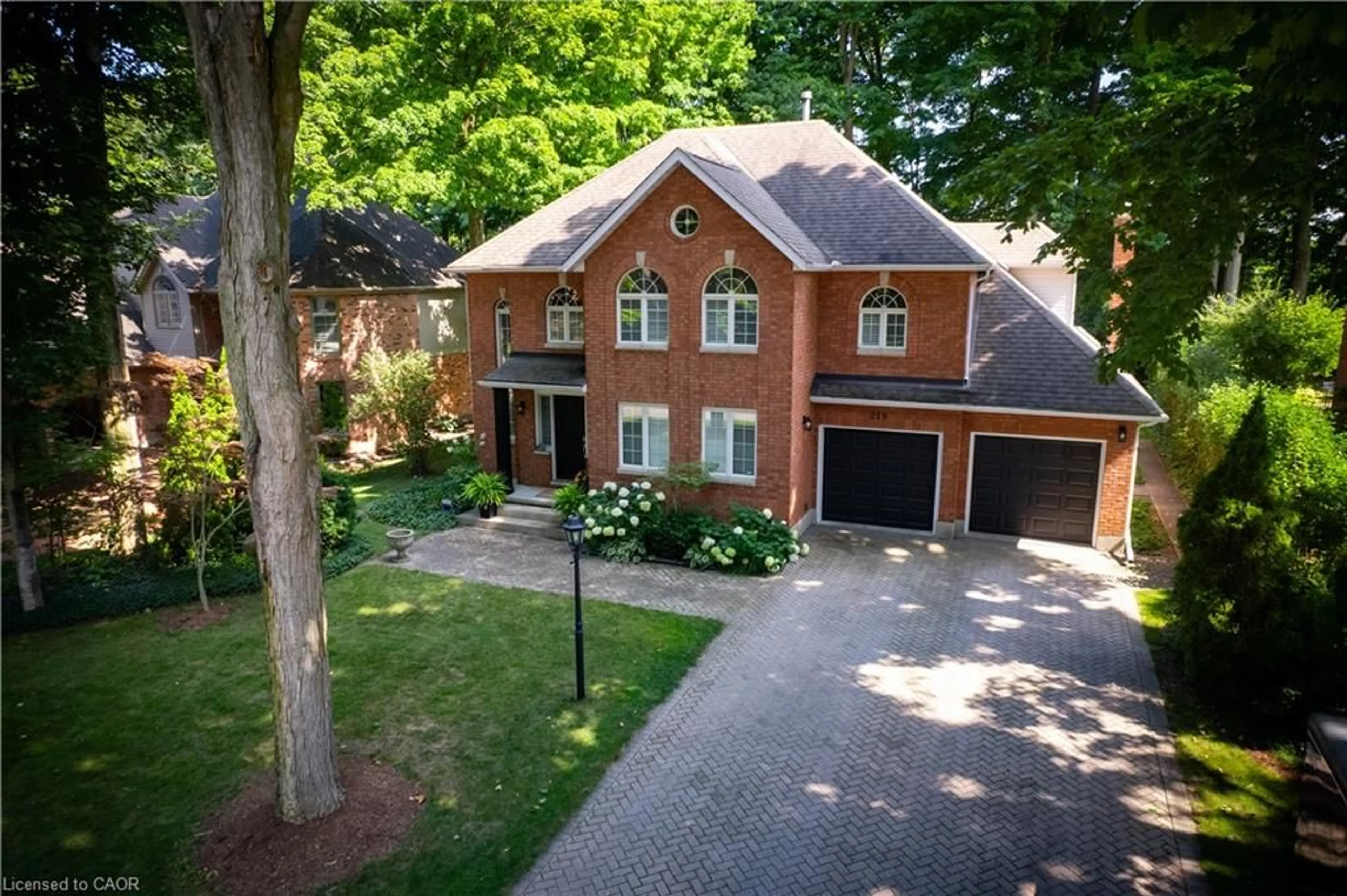 A pic from outside/outdoor area/front of a property/back of a property/a pic from drone, street for 219 Corrie Cres, Waterloo Ontario N2L 5W3