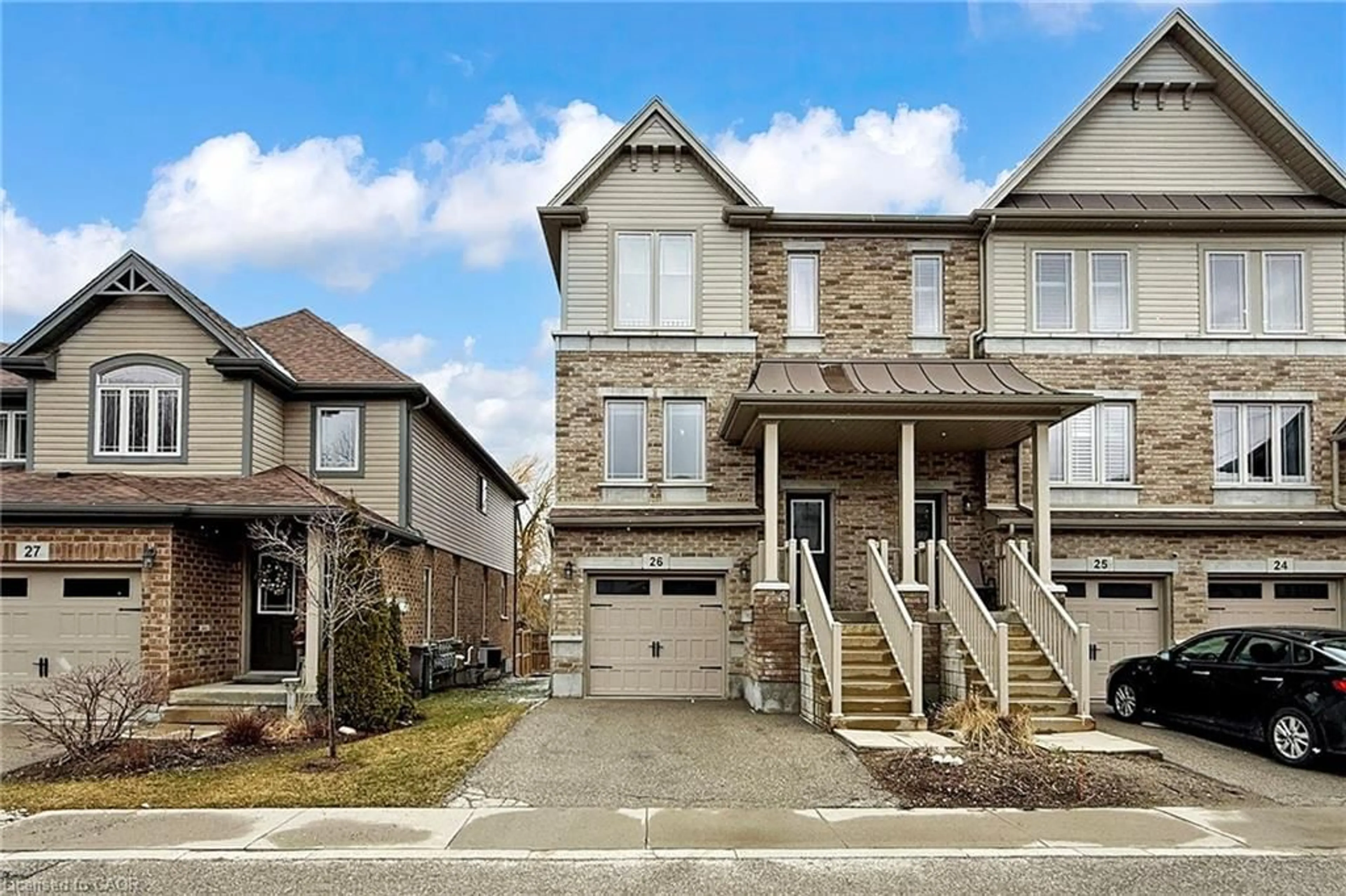 Home with brick exterior material, street for 66 Eastview Rd #26, Guelph Ontario N1E 0N1