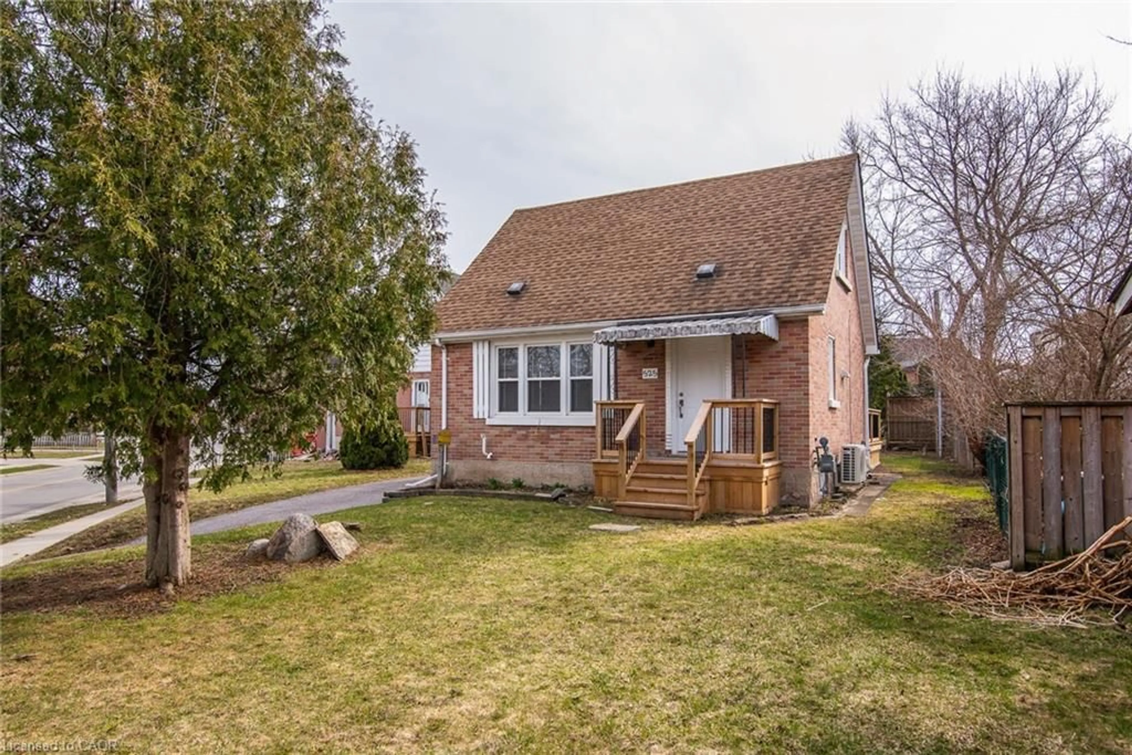 Home with brick exterior material, street for 525 Courtland Ave, Kitchener Ontario N2G 2W9
