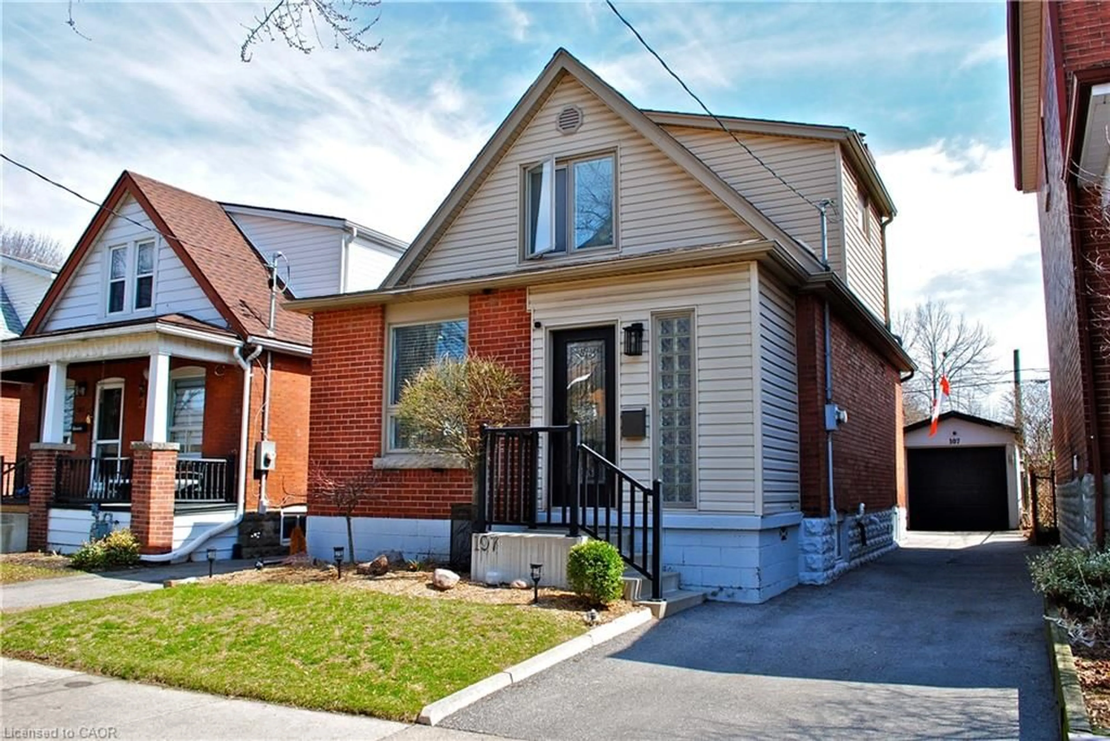 Home with brick exterior material, street for 107 Graham Ave, Hamilton Ontario L8K 2M2