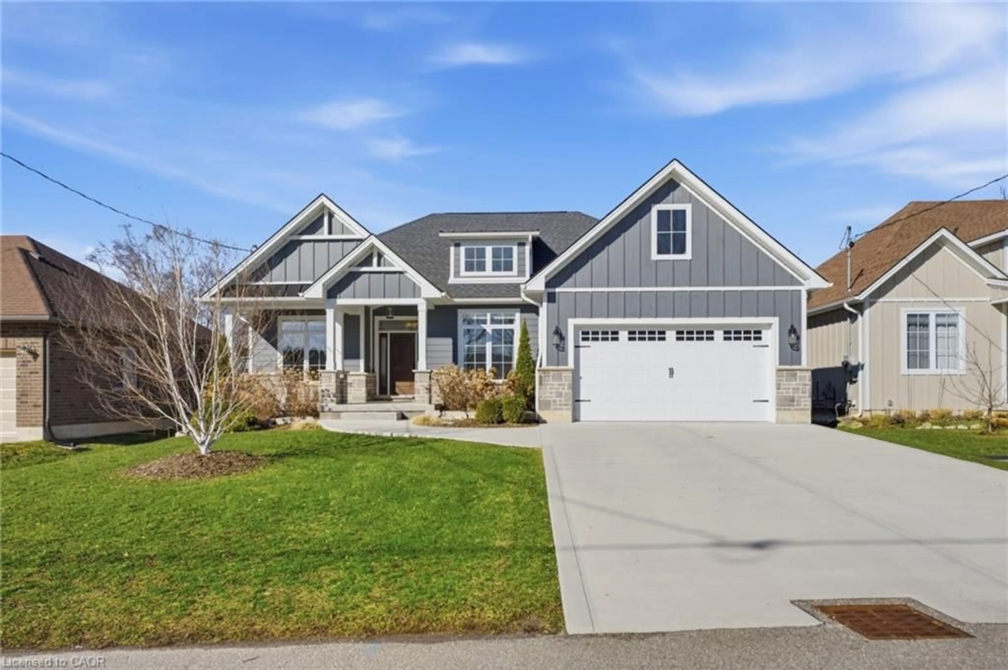 Home with vinyl exterior material, street for 9 East St, Port Dover Ontario N0A 1N5