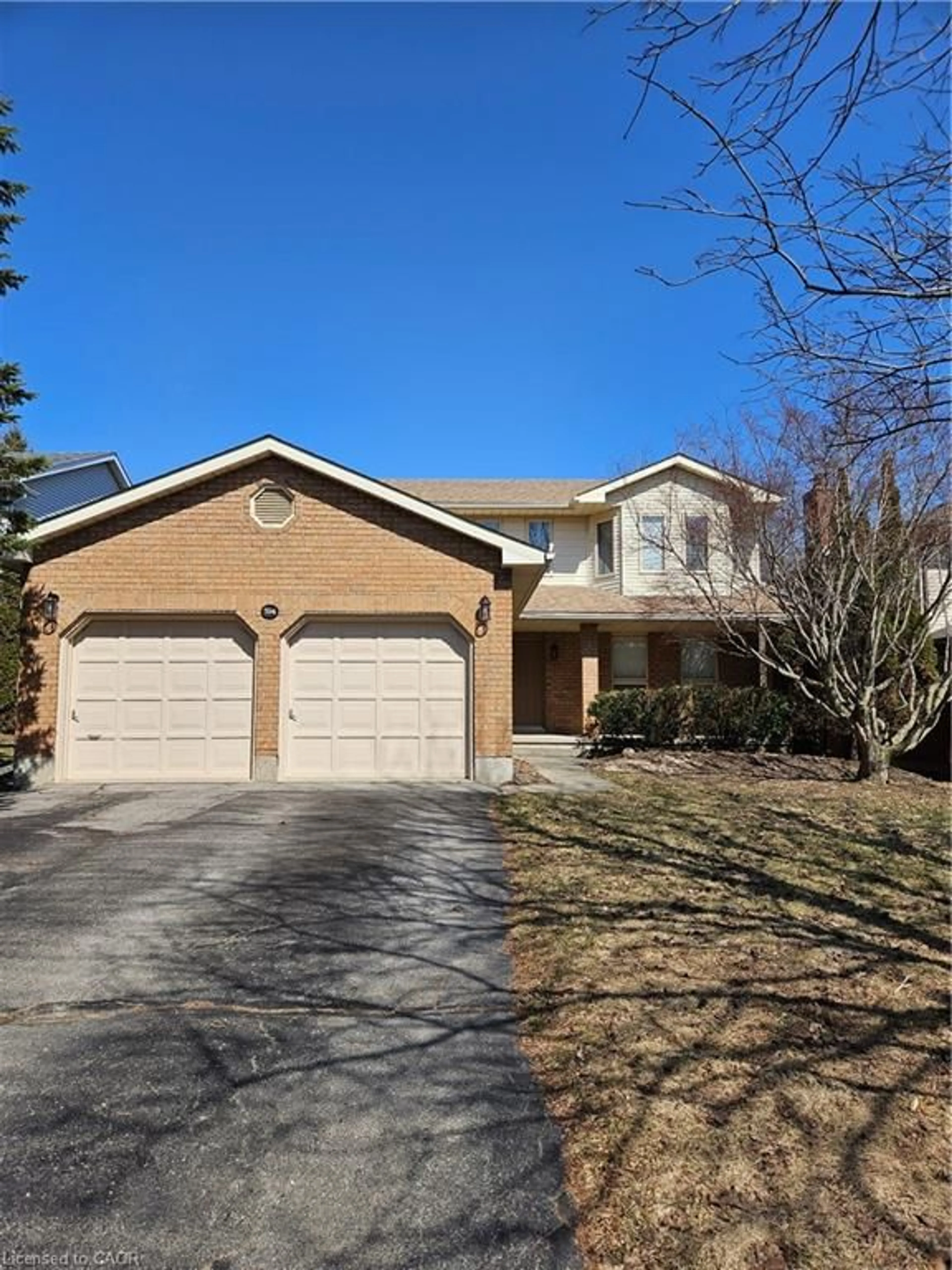 Home with brick exterior material, street for 594 Hunters Pl, Waterloo Ontario N2K 3L3