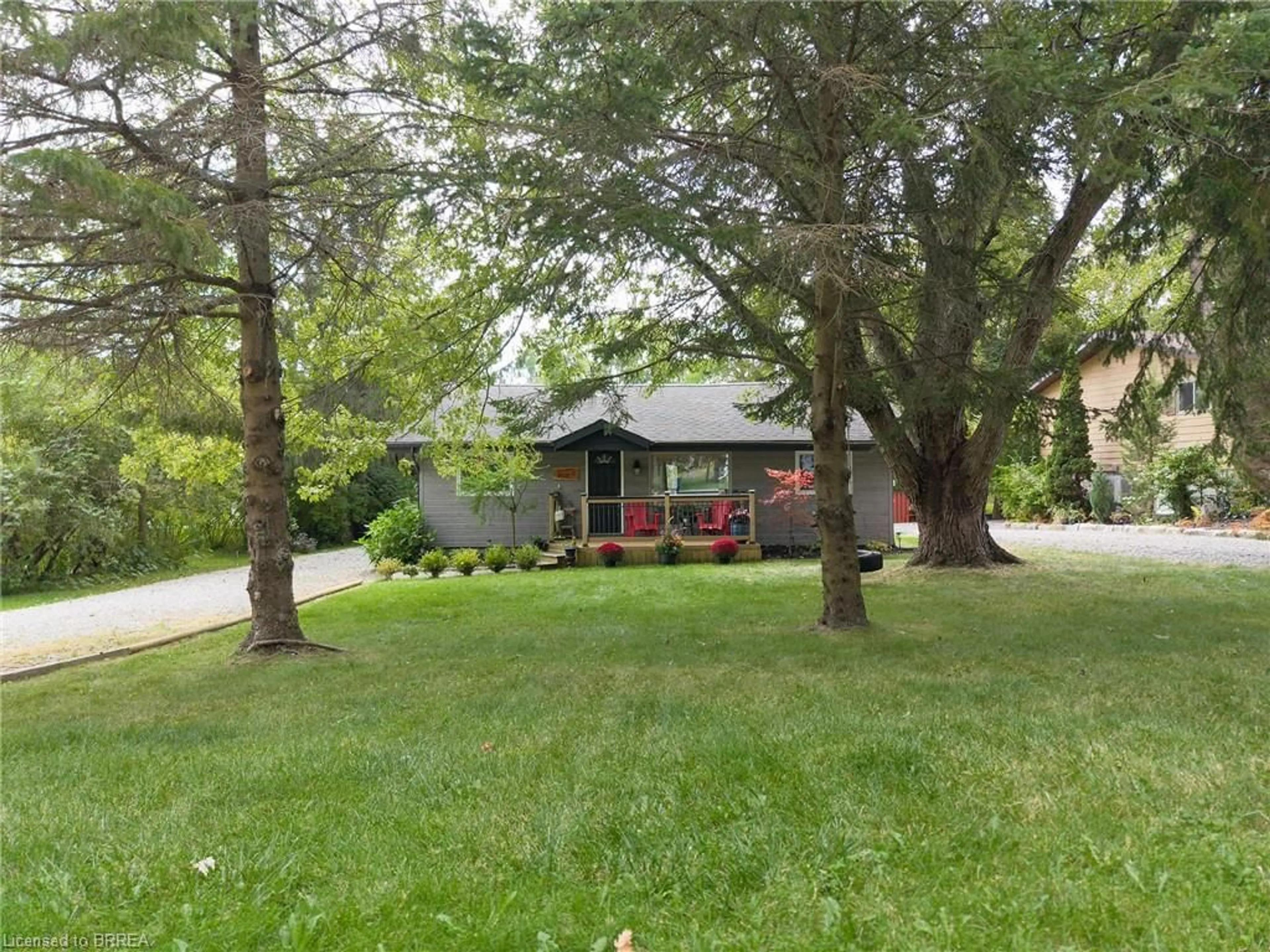 A pic from outside/outdoor area/front of a property/back of a property/a pic from drone, street for 114 Hillview Cres, Turkey Point Ontario N0E 1T0