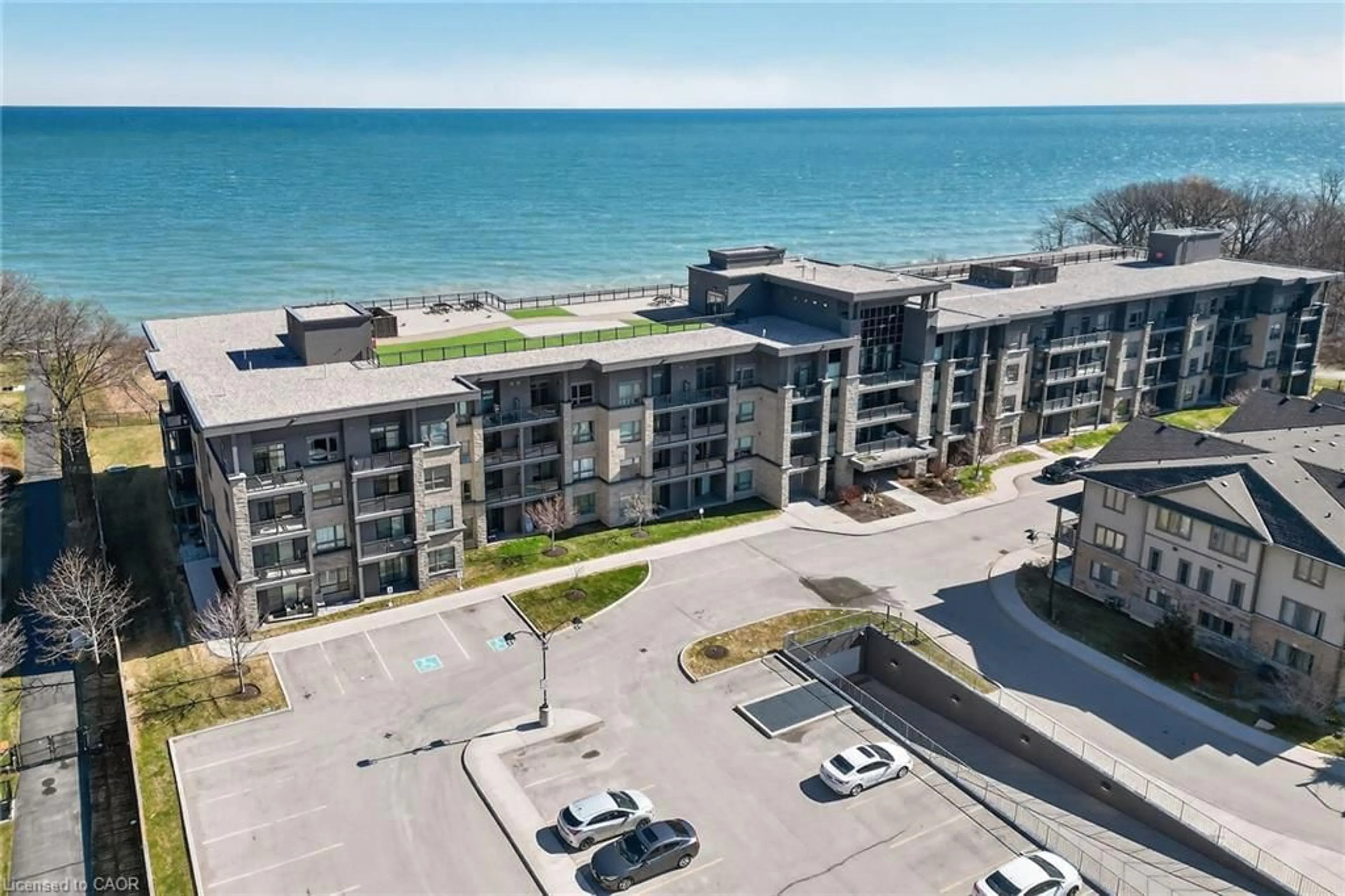 A pic from outside/outdoor area/front of a property/back of a property/a pic from drone, water/lake/river/ocean view for 35 Southshore Cres #327, Stoney Creek Ontario L8E 0J2