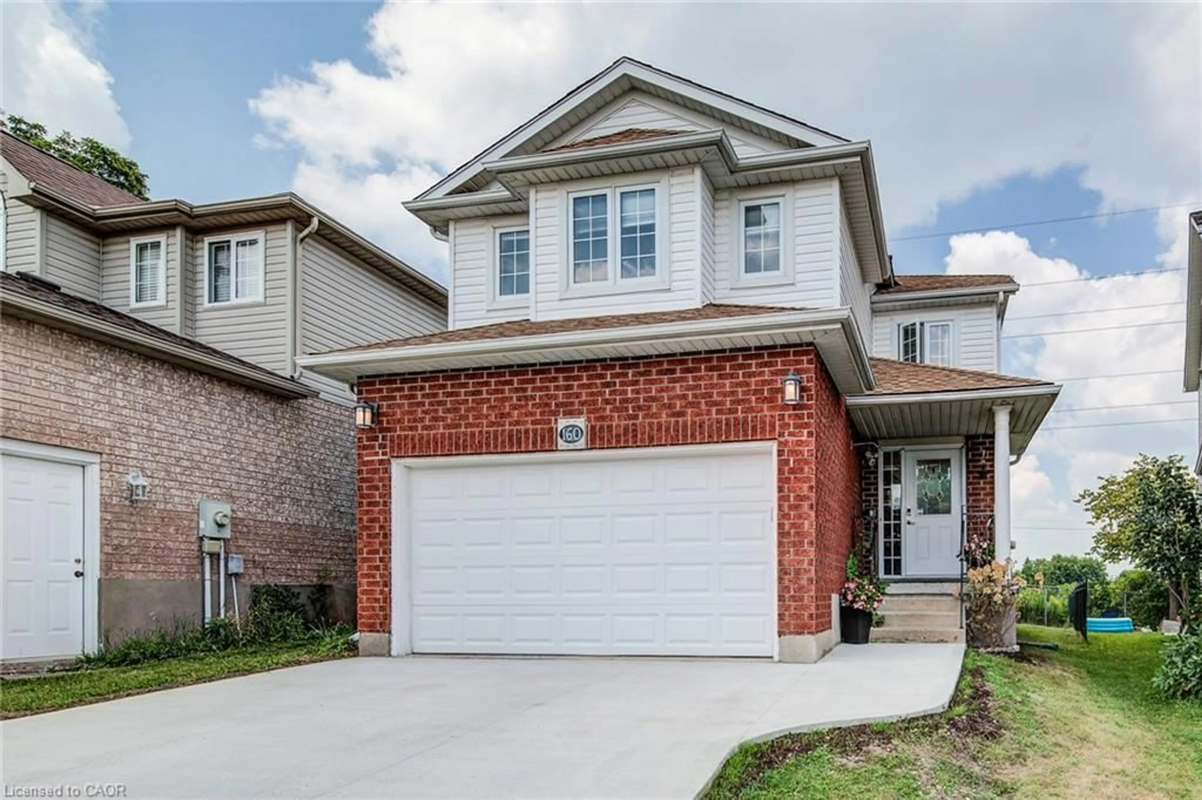Home with brick exterior material, street for 160 Hidden Creek Dr, Kitchener Ontario N2N 3N6