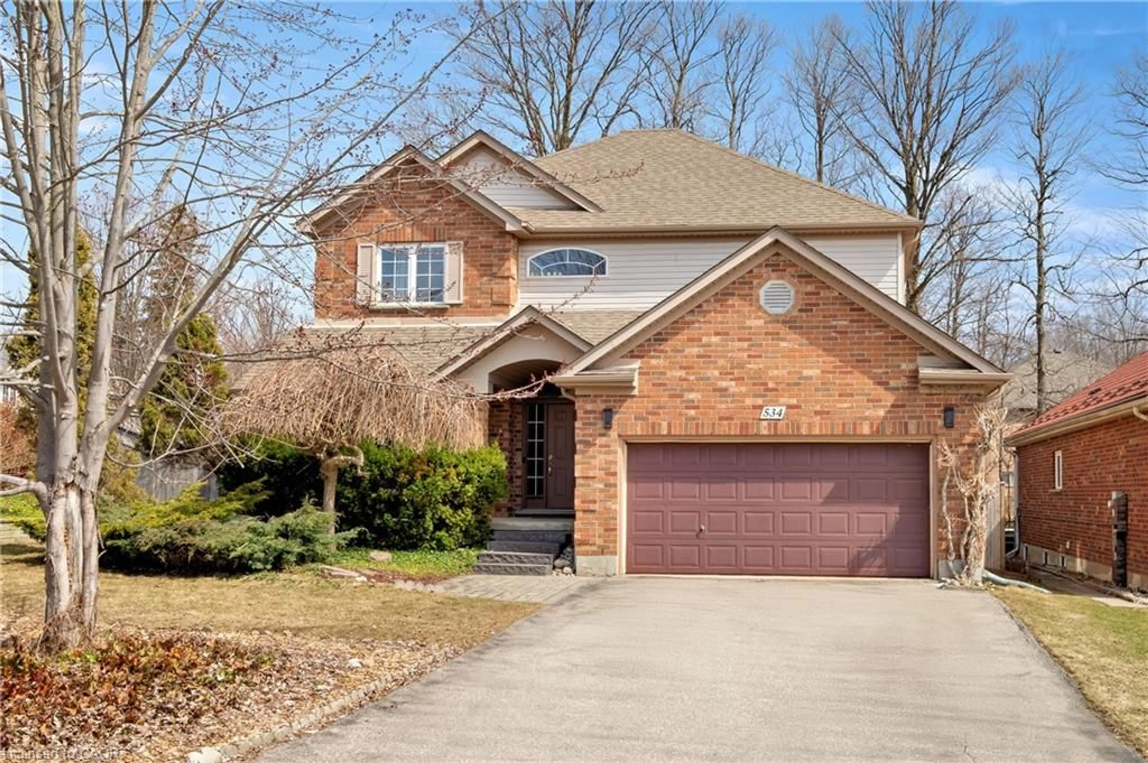 Home with brick exterior material, street for 534 Birchleaf Walk, Waterloo Ontario N2T 2W5