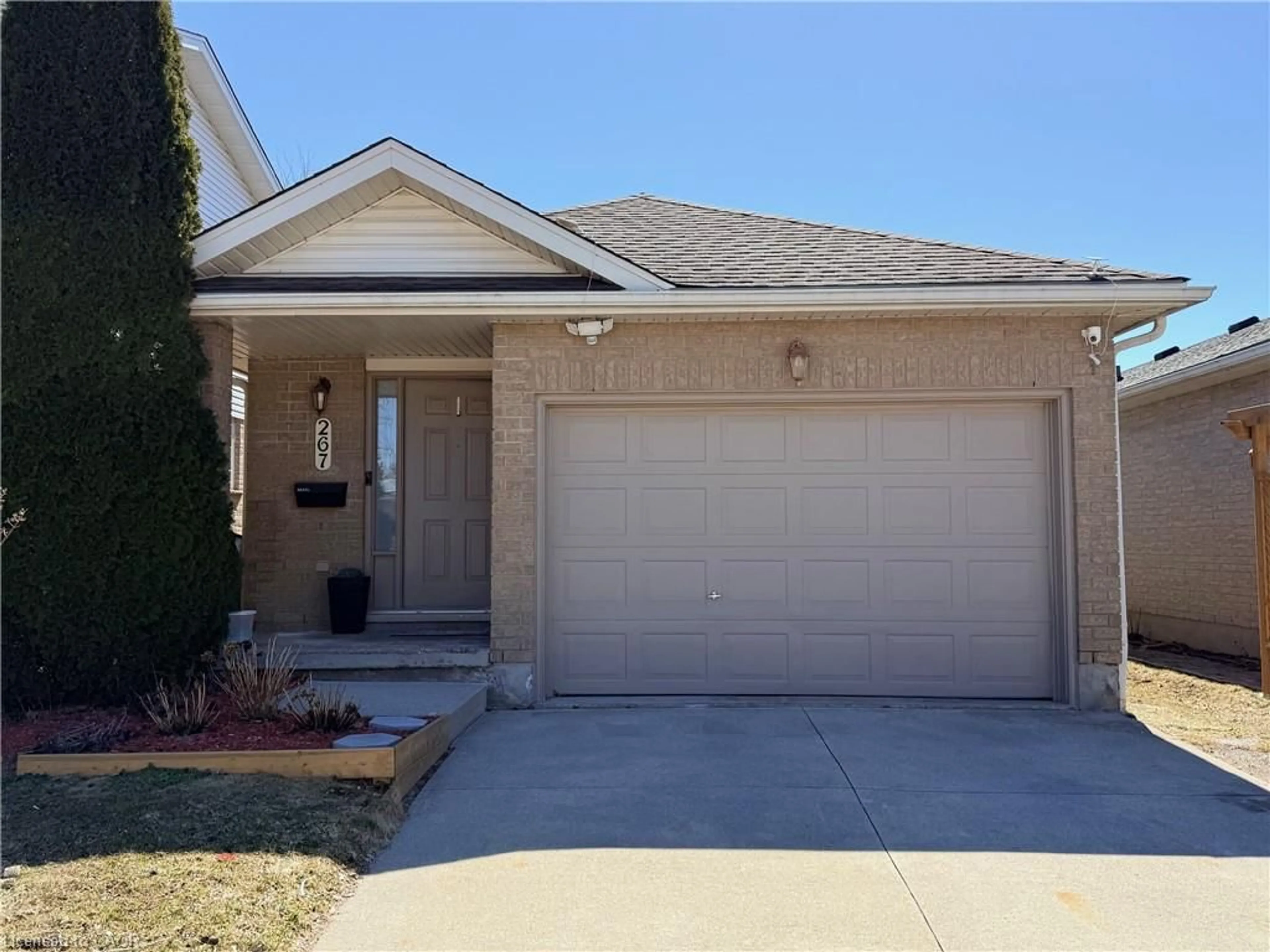 Home with brick exterior material, street for 267 Grey Fox Dr, Kitchener Ontario N2E 3N8