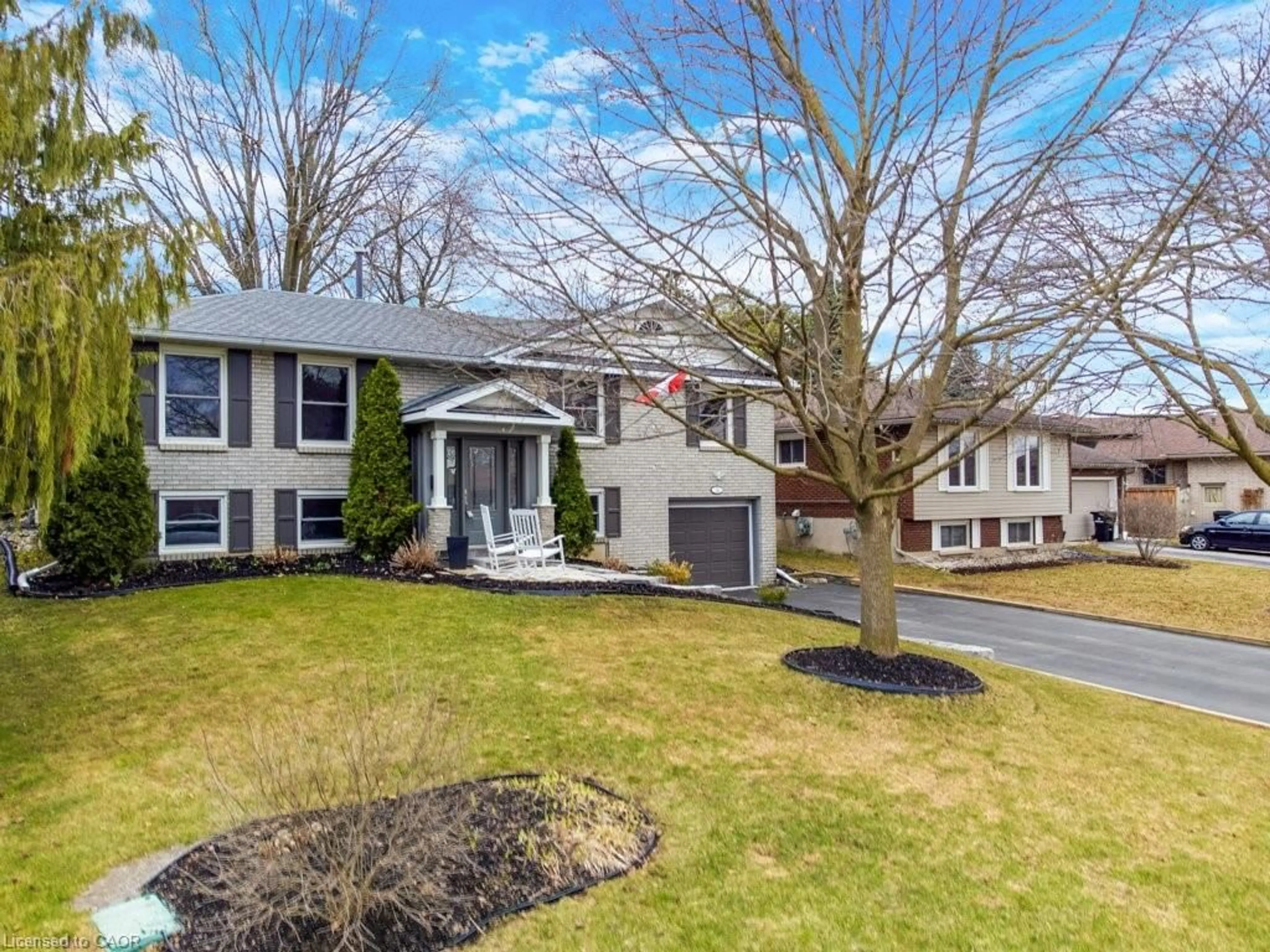 Home with vinyl exterior material, street for 34 Leslie Ave, Cambridge Ontario N1S 4N7