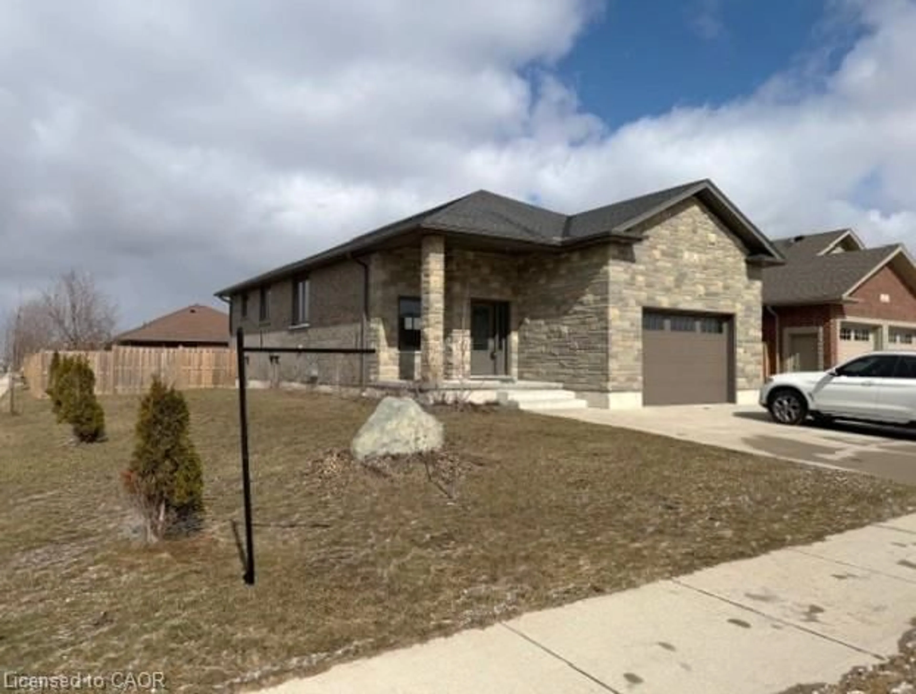 Home with brick exterior material, street for 13 Forbes Cres, Listowel Ontario N4W 0B3
