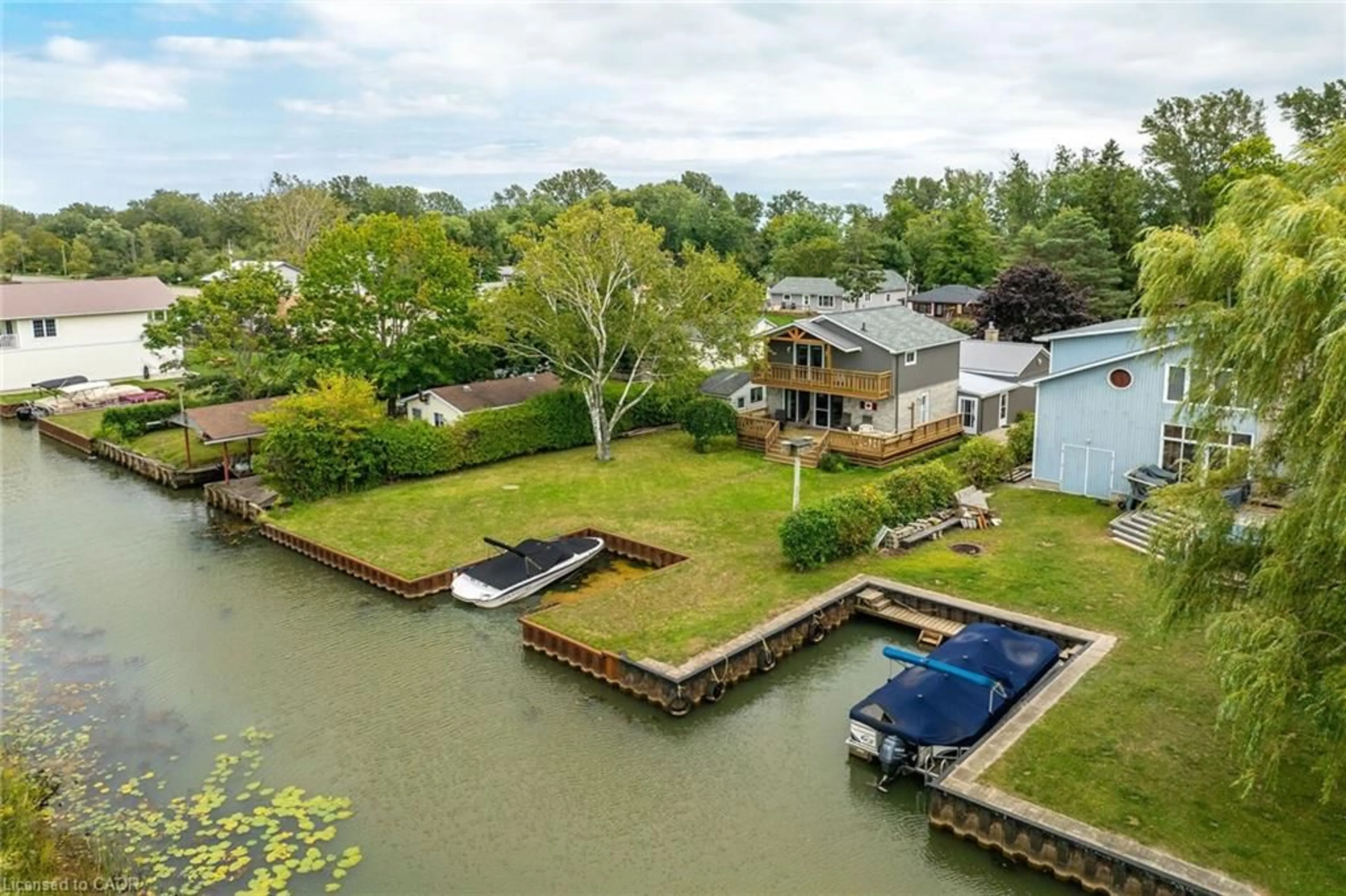A pic from outside/outdoor area/front of a property/back of a property/a pic from drone, water/lake/river/ocean view for 270 Erie Blvd, Long Point Ontario N0E 1M0