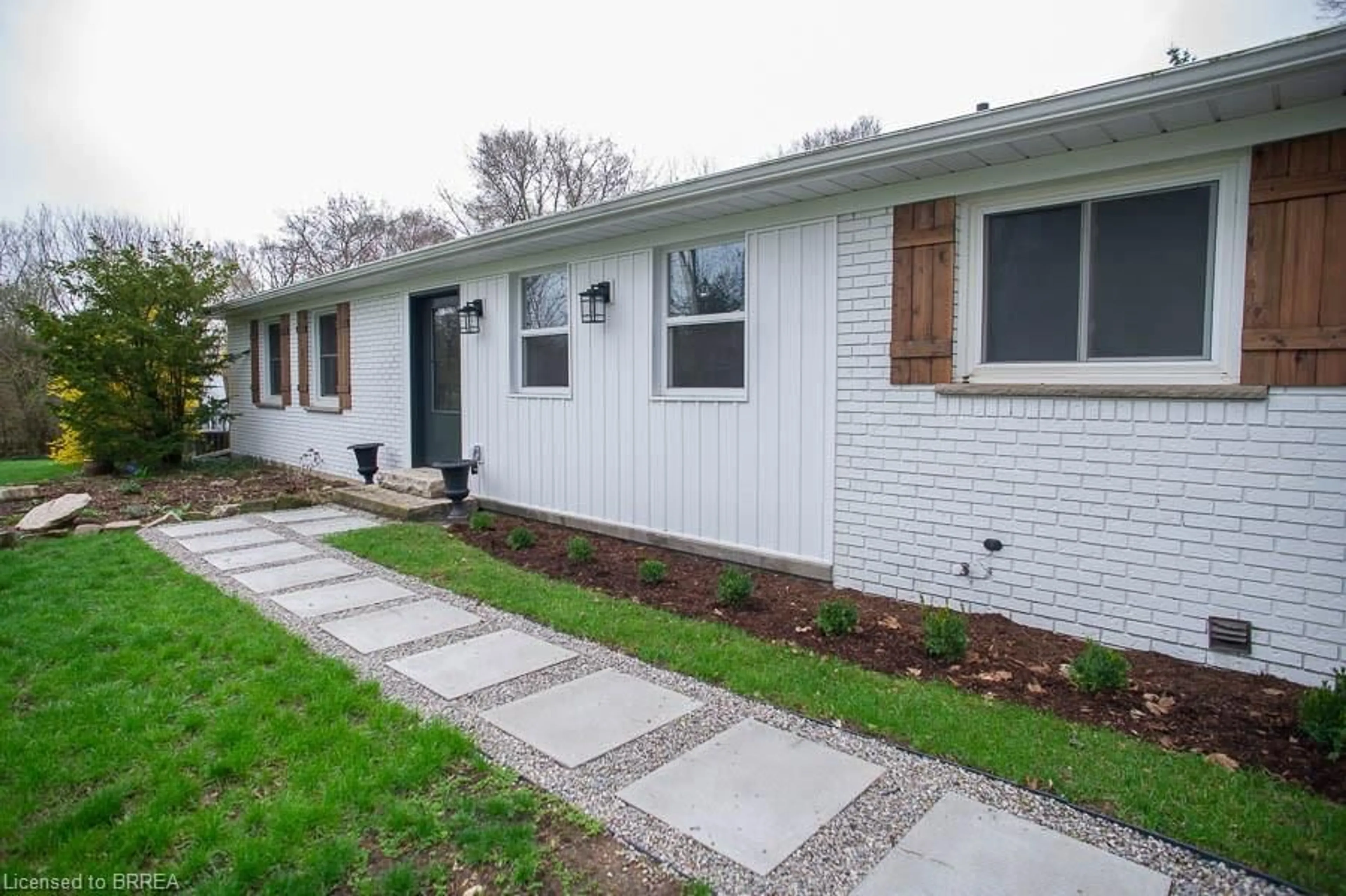 Home with vinyl exterior material, street for 20 Russell St, Mount Pleasant Ontario N0E 1K0