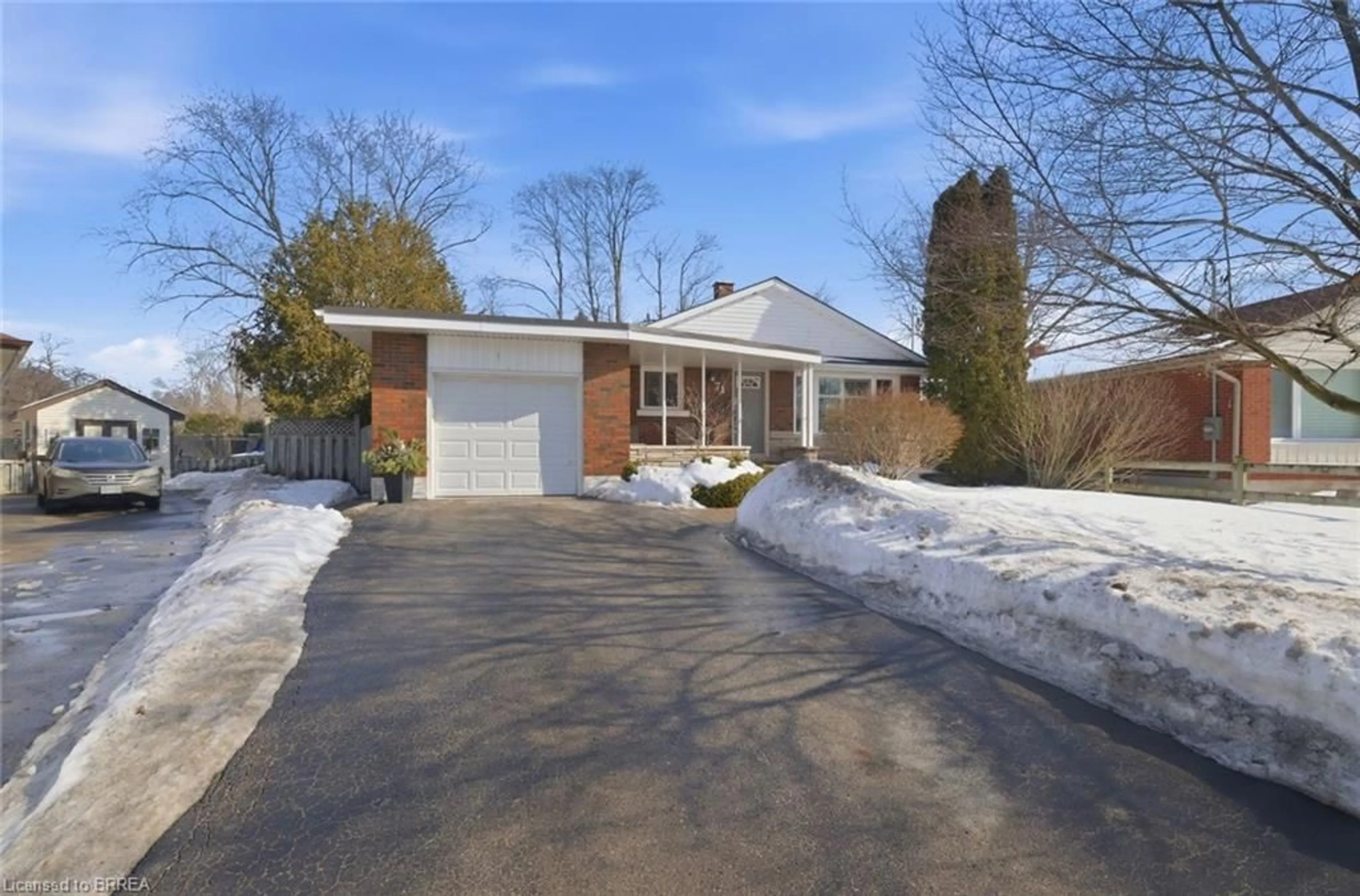 Home with brick exterior material, street for 71 Pinecrest Dr, Kitchener Ontario N2A 2G6