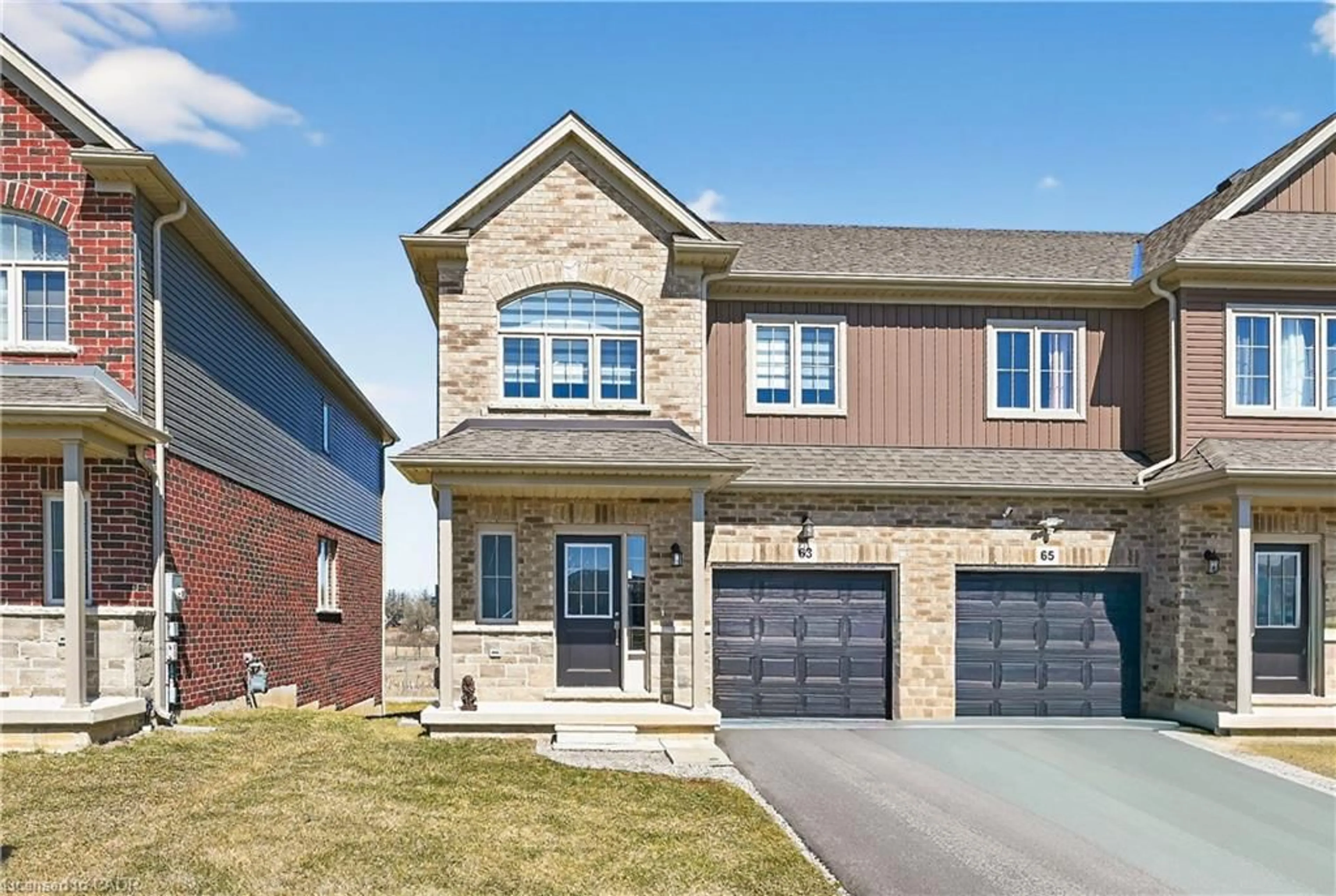 Home with brick exterior material, street for 63 Lloyd Davies Way, Binbrook Ontario L0R 1C0