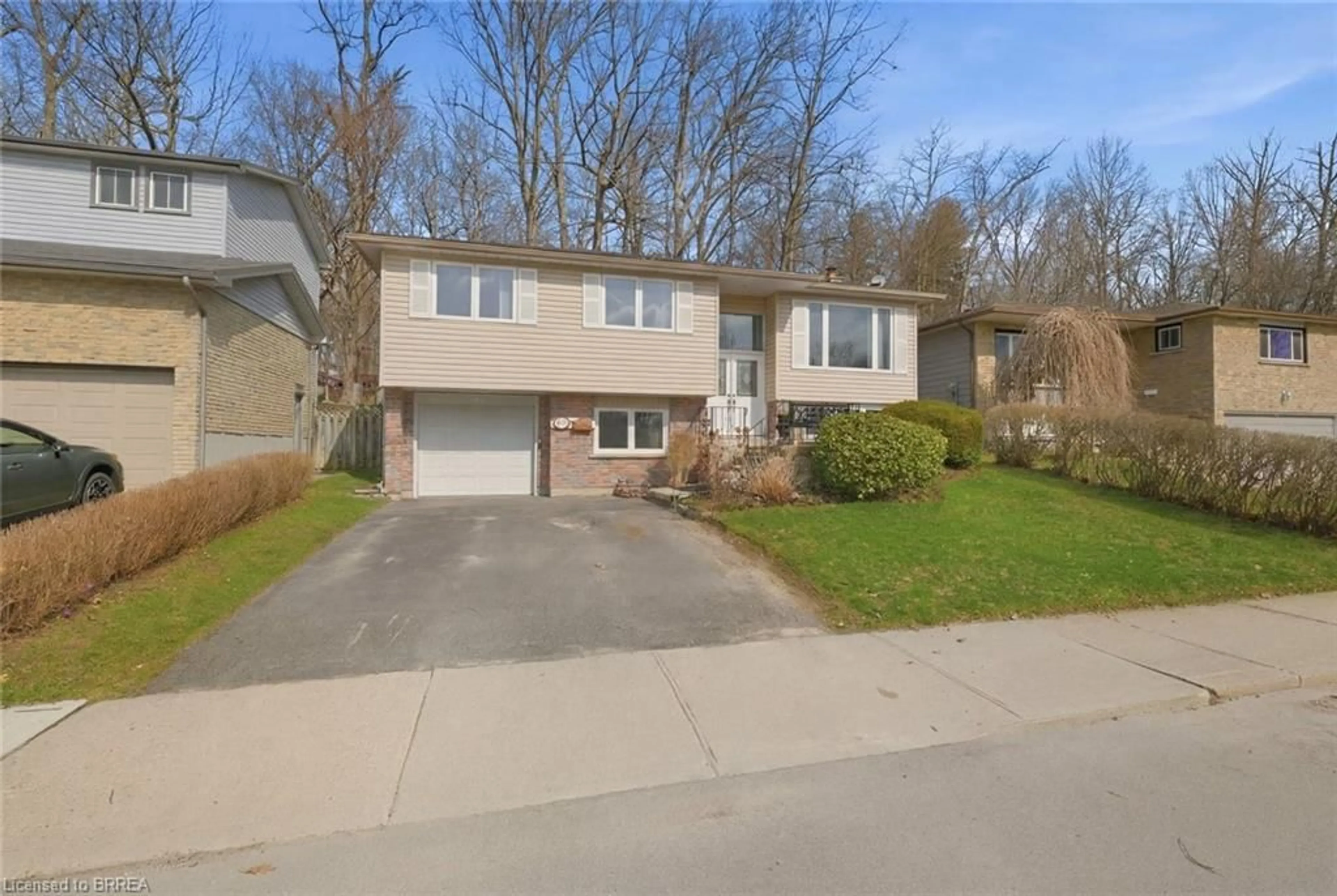 Home with vinyl exterior material, street for 147 Forest Rd, Brantford Ontario N3S 7L5