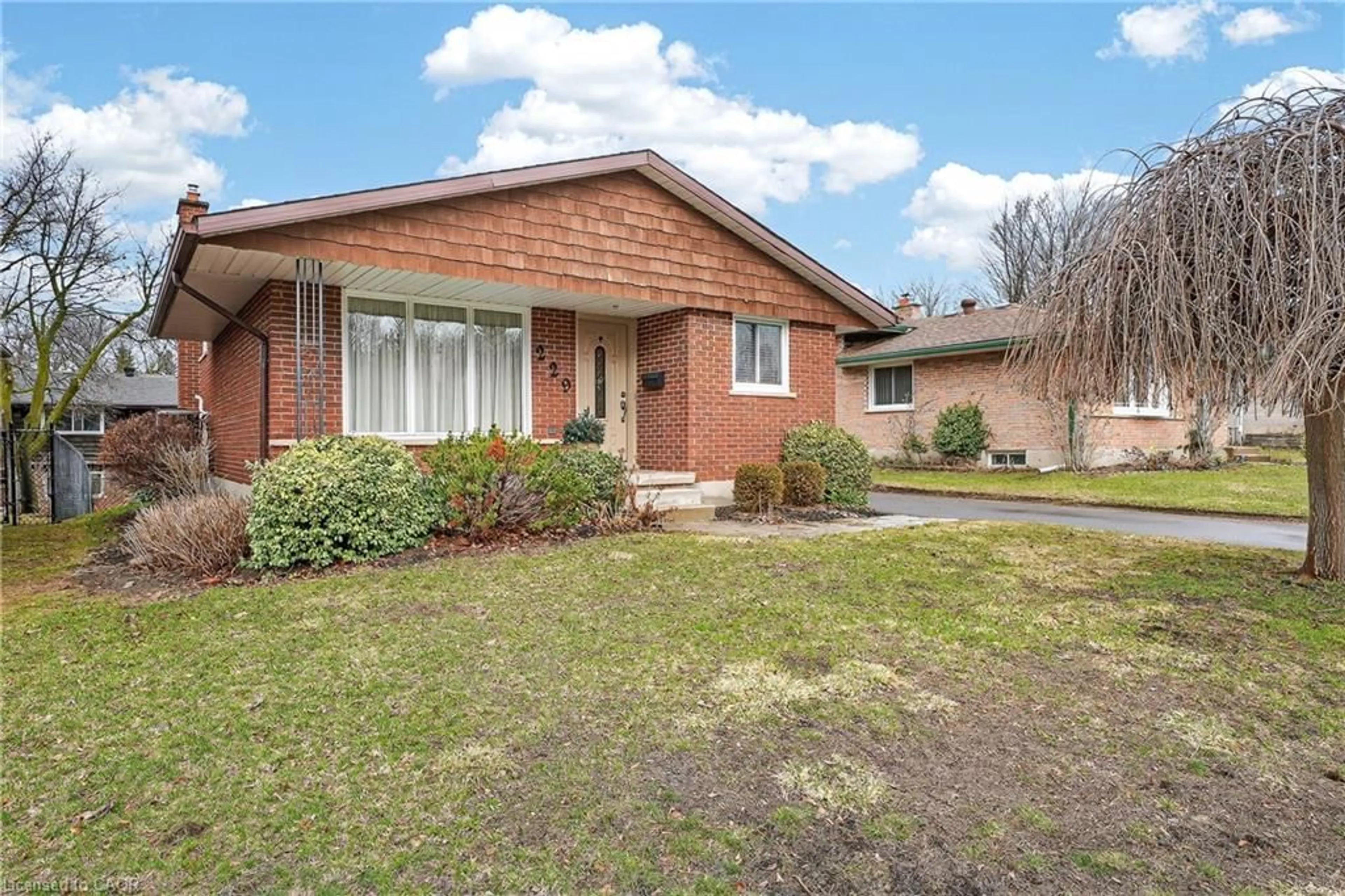 Home with brick exterior material, street for 229 Laurentian Dr, Kitchener Ontario N2E 2G5