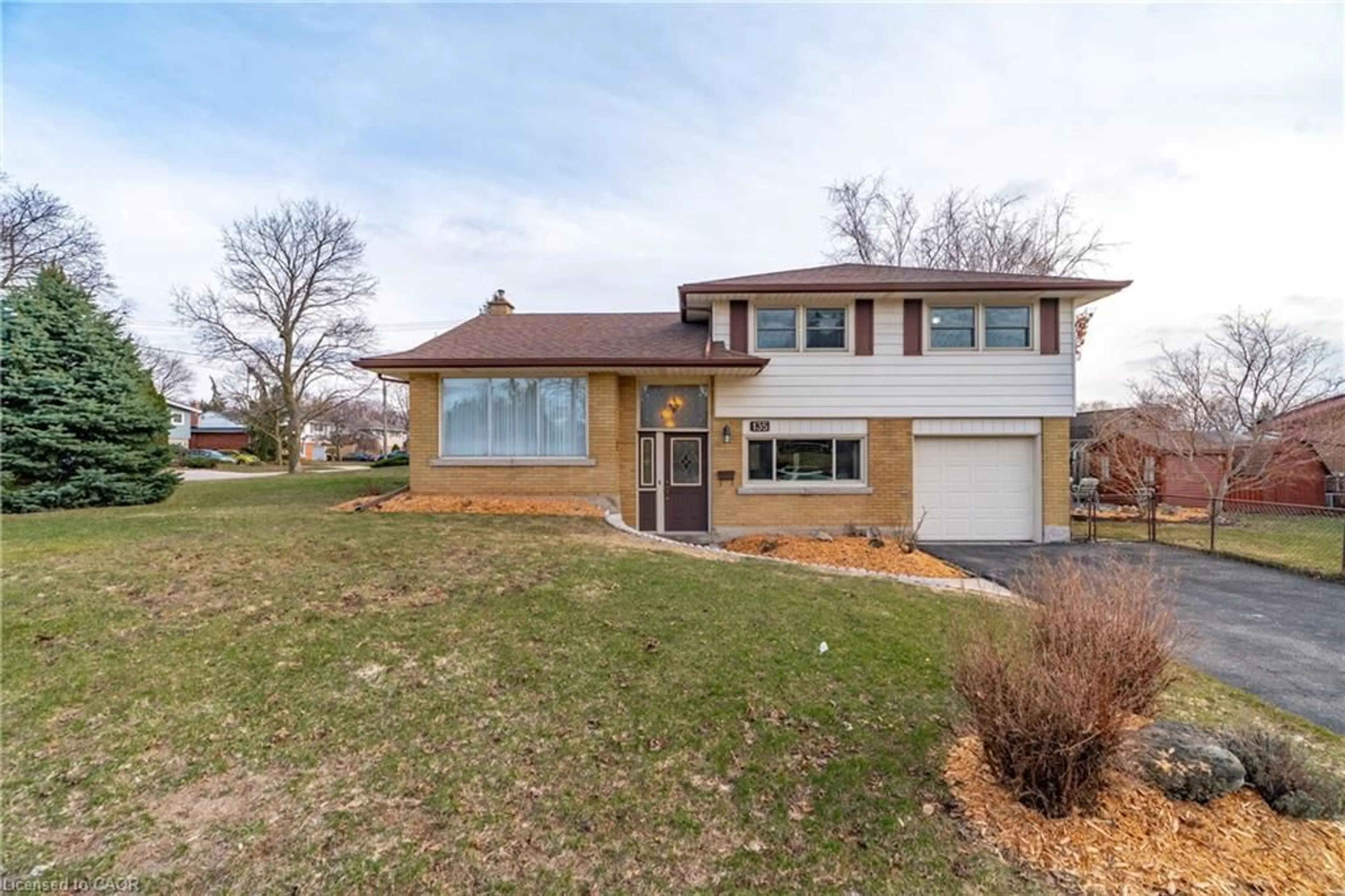 Home with brick exterior material, street for 135 Burbank Rd, Kitchener Ontario N2B 1E3