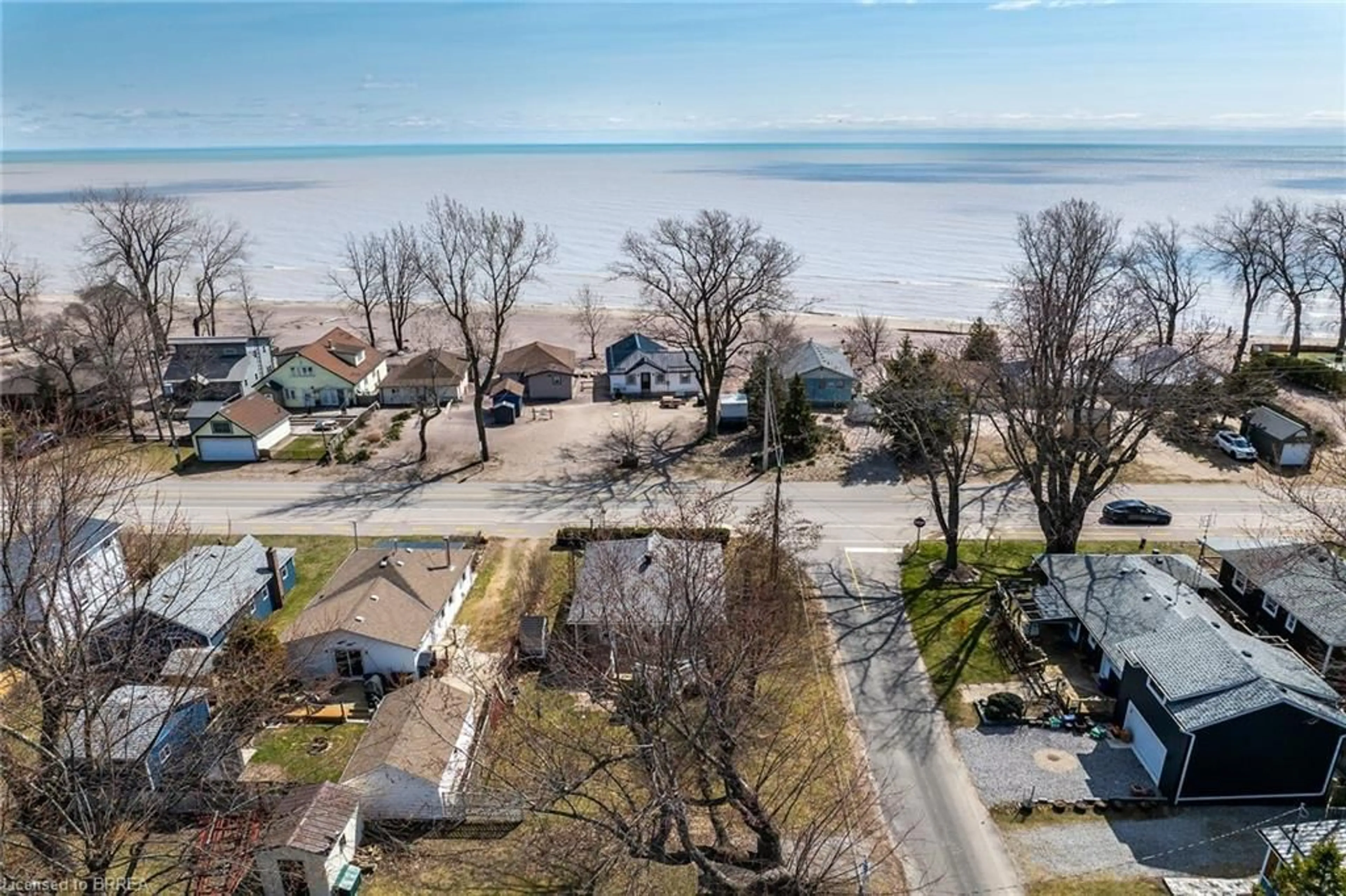 A pic from outside/outdoor area/front of a property/back of a property/a pic from drone, water/lake/river/ocean view for 88 Erie Blvd, Long Point Ontario N0E 1M0